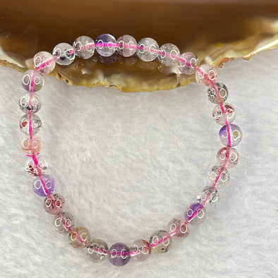 Natural super 7 Crystal Bracelet 10.00g 6.3mm 30beads - Huangs Jadeite and Jewelry Pte Ltd