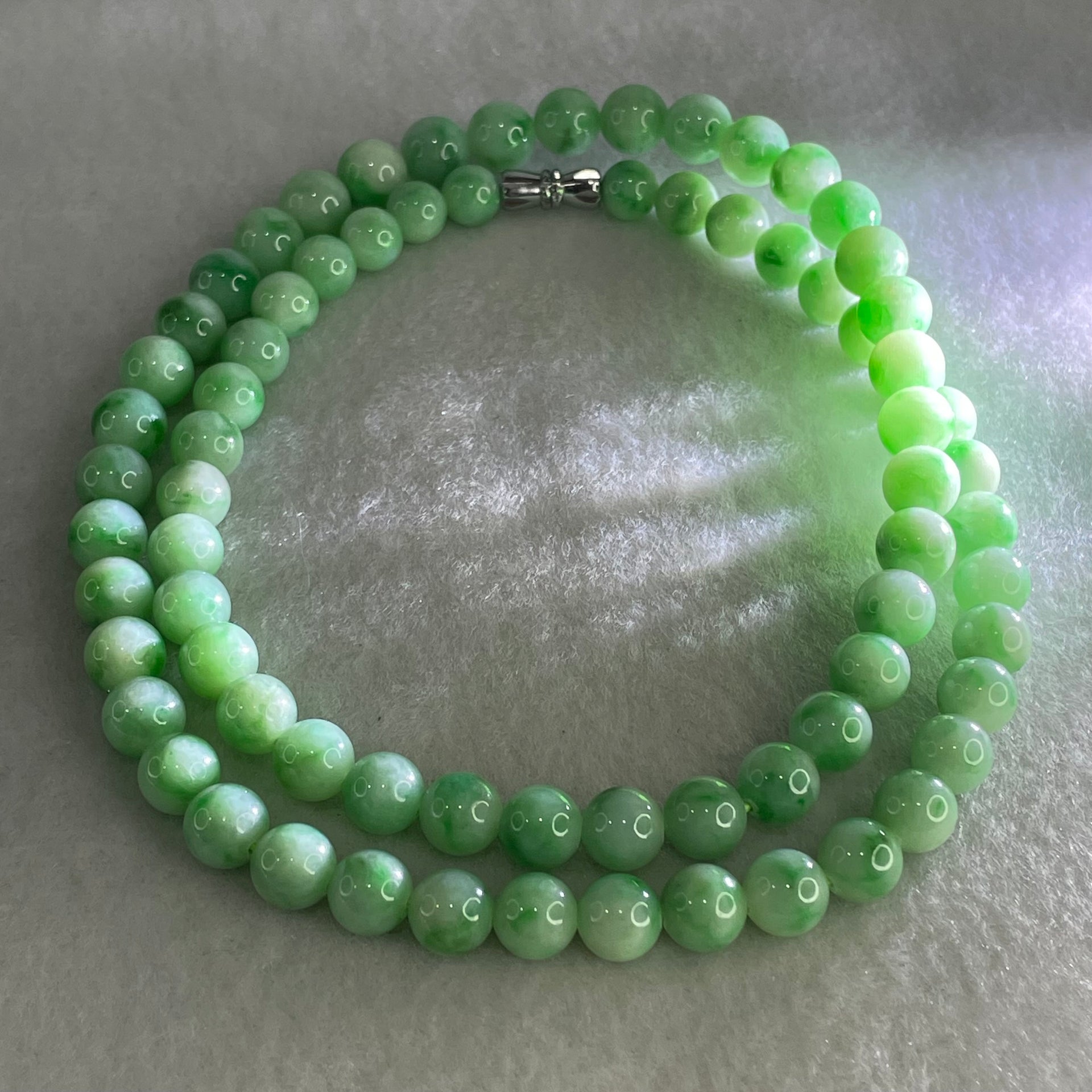 Good Grade Type A Apple Green with Emerald Green Piao Hua Jadeite Beads Necklace 50.33g 54cm 6.9 to 7.8mm 74 Beads - Huangs Jadeite and Jewelry Pte Ltd