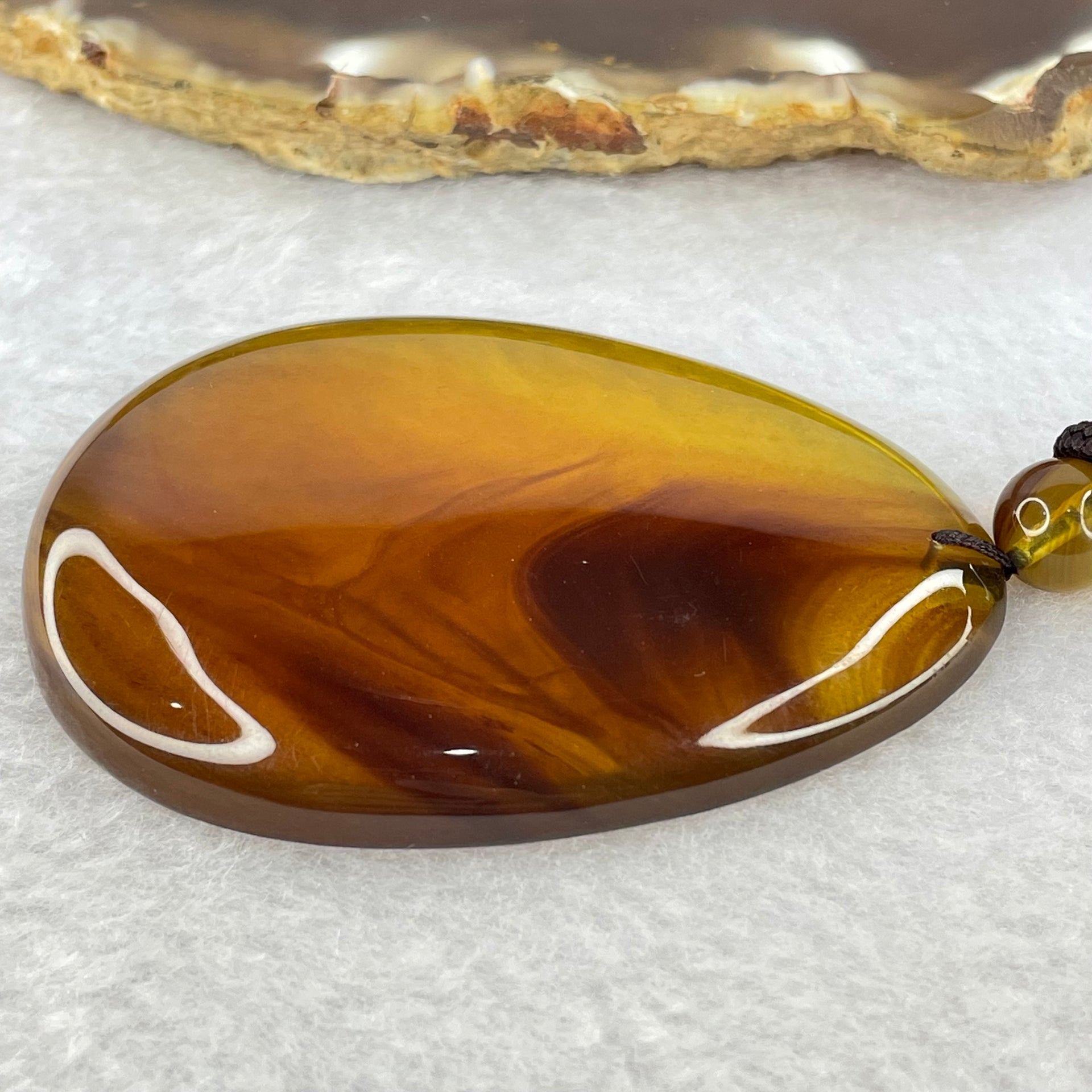 Natural Cognac with Red Amber Pendent 15.33g 65.3 by 46.3 by 14.0mm - Huangs Jadeite and Jewelry Pte Ltd