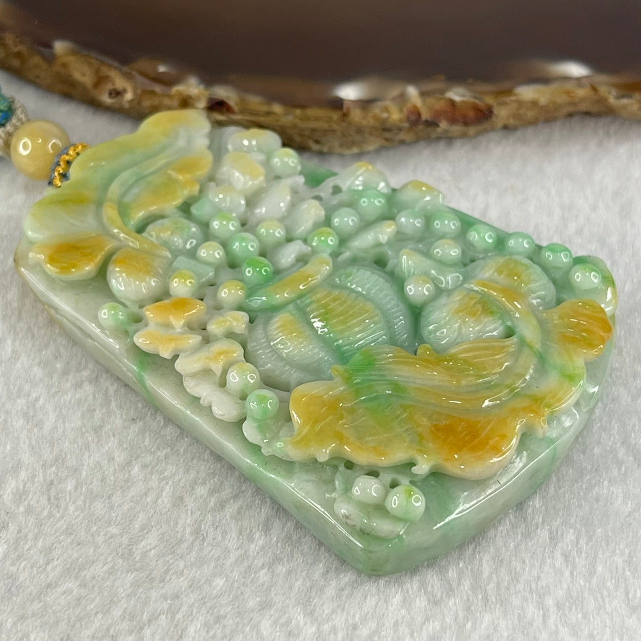 Grand Master Type A Green with Yellow Patches Jadeite Goldfish Pair and Basket of Flowers Pendant 连年有余 109.37g 76.2 by 53.5 by 12.3mm - Huangs Jadeite and Jewelry Pte Ltd