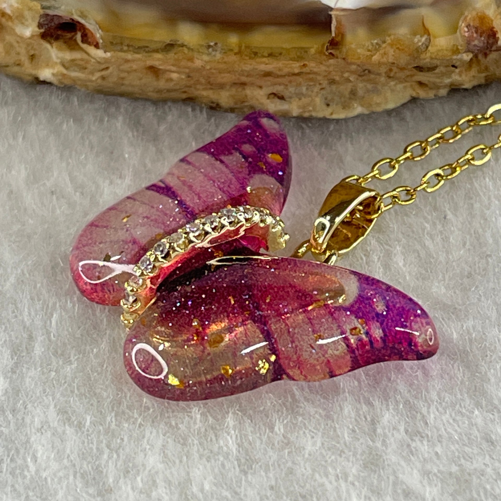 Man Made Pink Butterfly Pendant with Gold Color Necklace 3.39g 25.4 by 17.6 by 4.2mm - Huangs Jadeite and Jewelry Pte Ltd