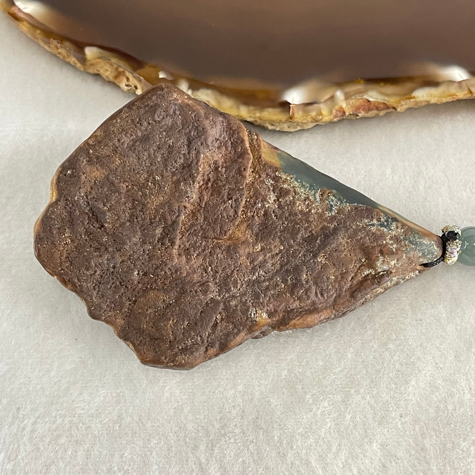 Grand Master Type A Brown with Blueish Green Jadeite Shan Shui with Guiren Benefactor Pendant 107.48g 74.0 by 53.9 by 23.3mm - Huangs Jadeite and Jewelry Pte Ltd