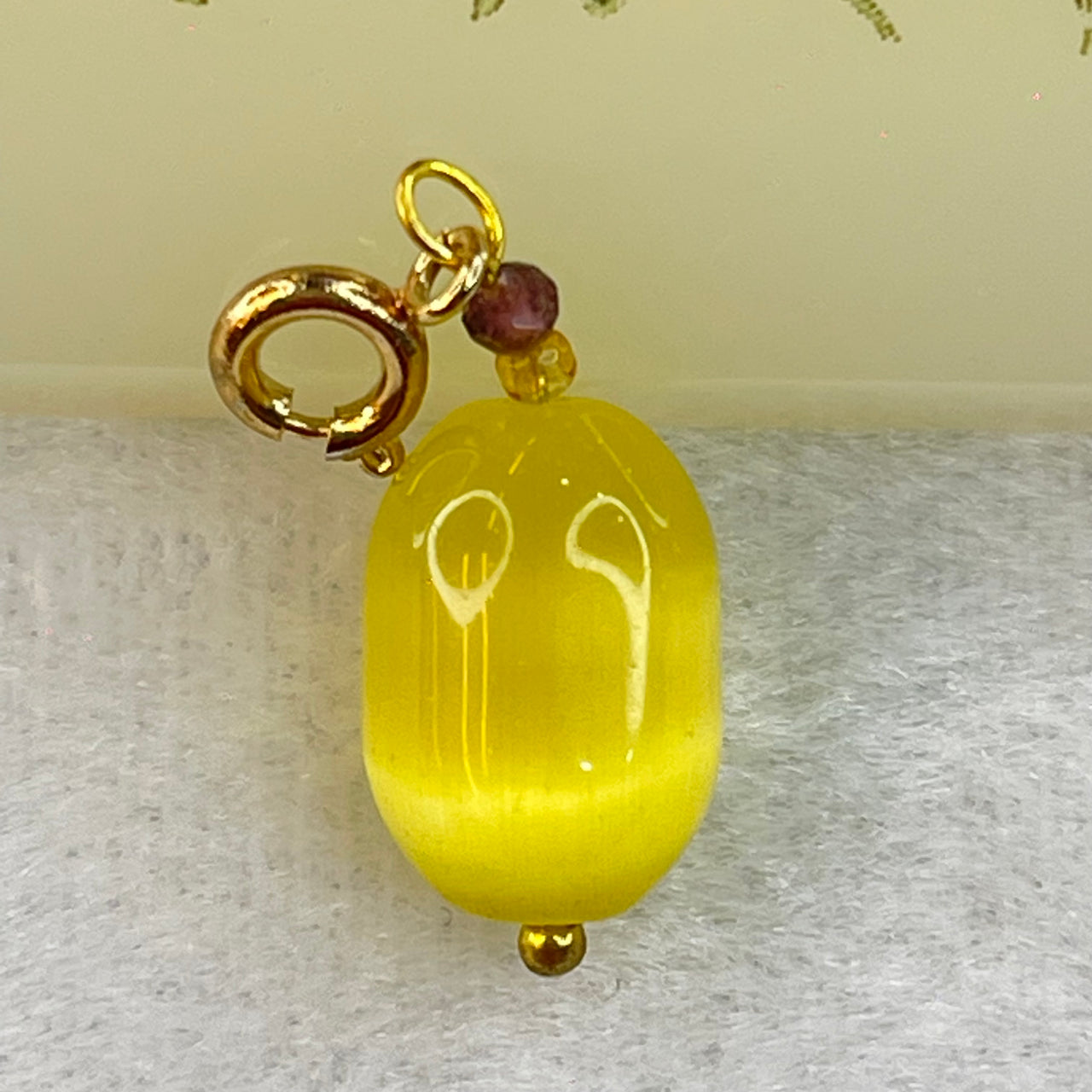 Yellow Cat's Eye Glass Charm Pendent 2.43g 14.4 by 10.0mm - Huangs Jadeite and Jewelry Pte Ltd