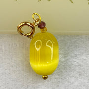 Yellow Cat's Eye Glass Charm Pendent 2.43g 14.4 by 10.0mm - Huangs Jadeite and Jewelry Pte Ltd