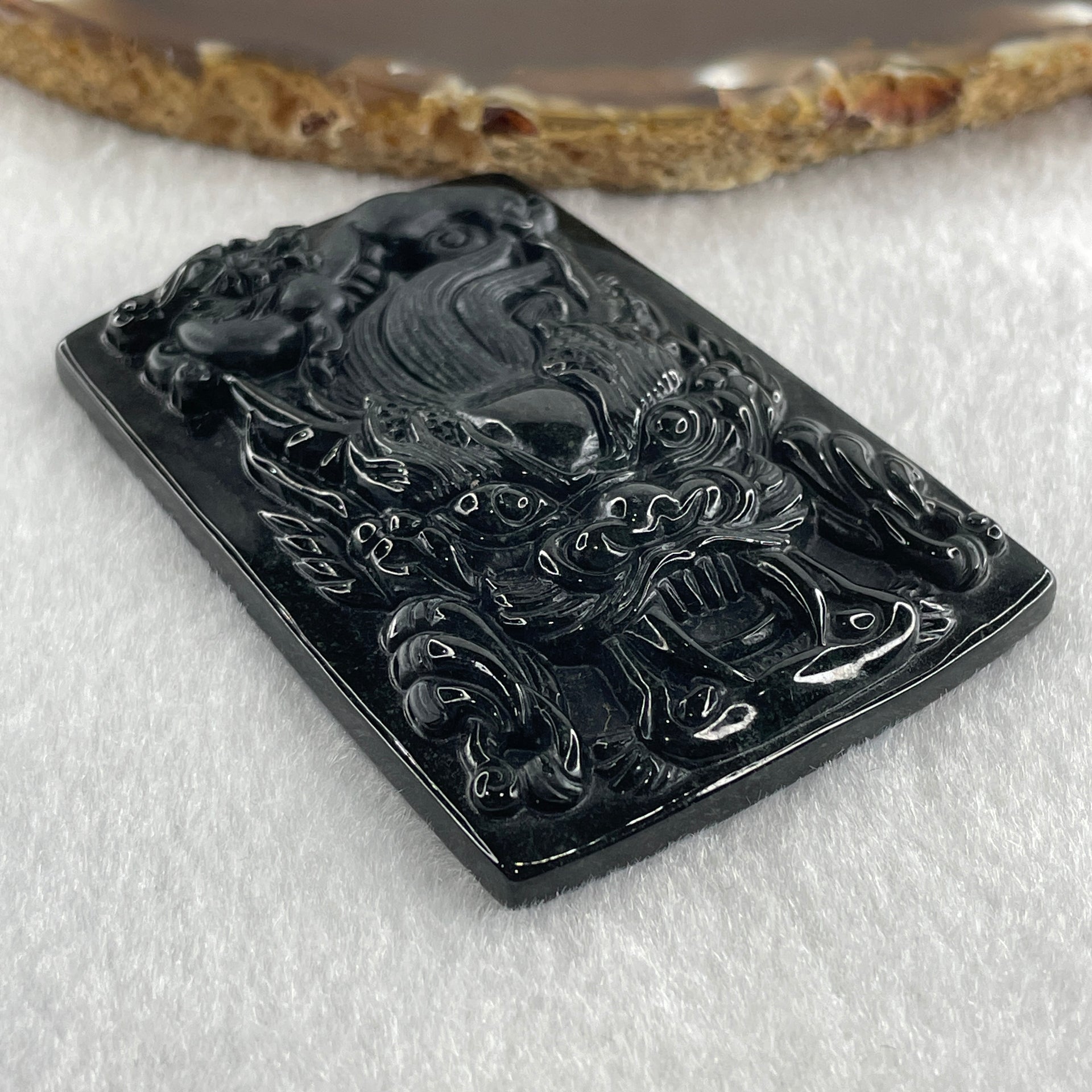 Type A Opaque to Partial Translucent Black Omphacite Jadeite Dragon with pixiu Pendant 45.42g 66.0 by 45.5 by 9.2mm - Huangs Jadeite and Jewelry Pte Ltd