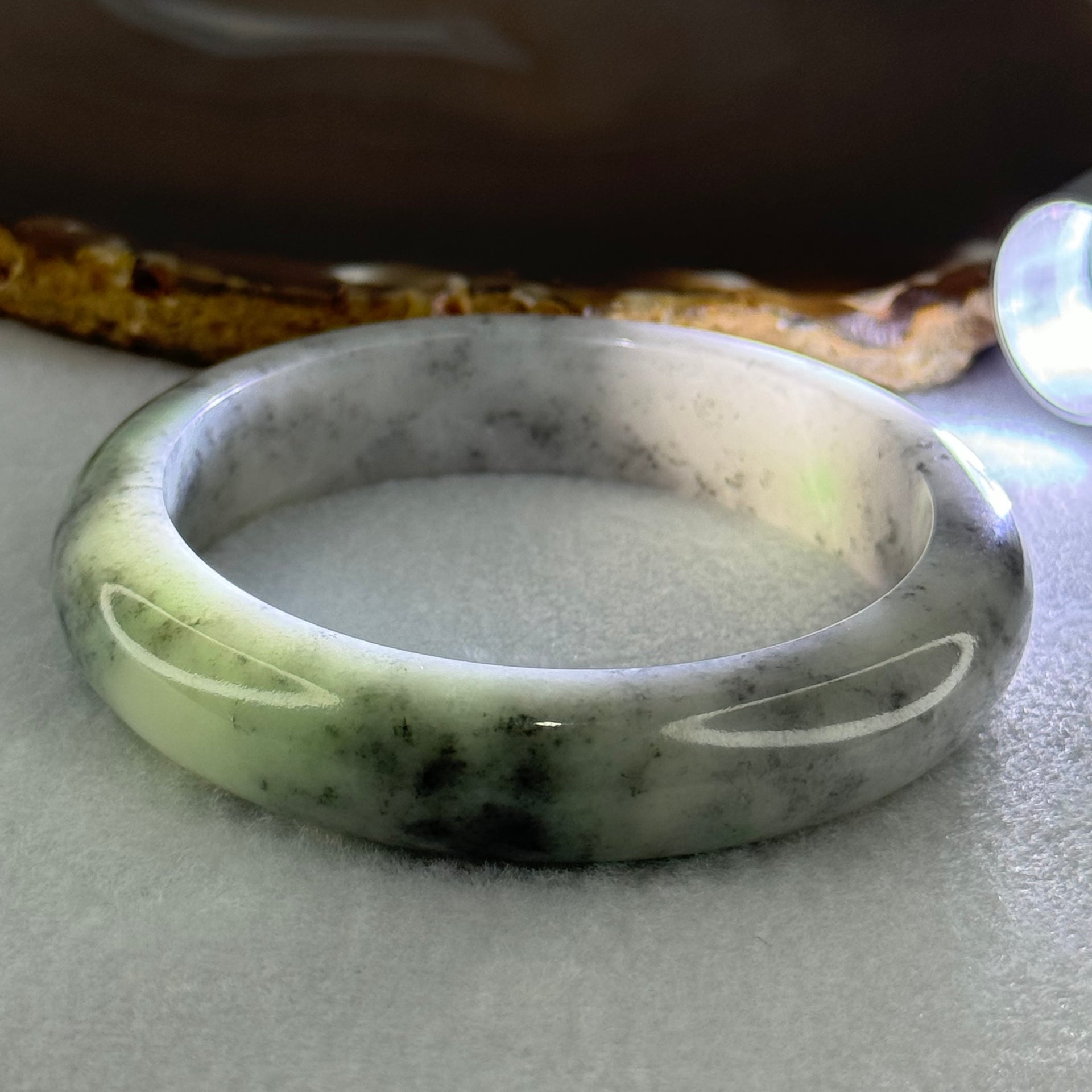 Type A Faint Green and Black Piao Hua Jadeite Bangle Internal Diameter 57.2mm 65.08g 13.4 by 8.7mm (Very Slight Internal Lines) - Huangs Jadeite and Jewelry Pte Ltd