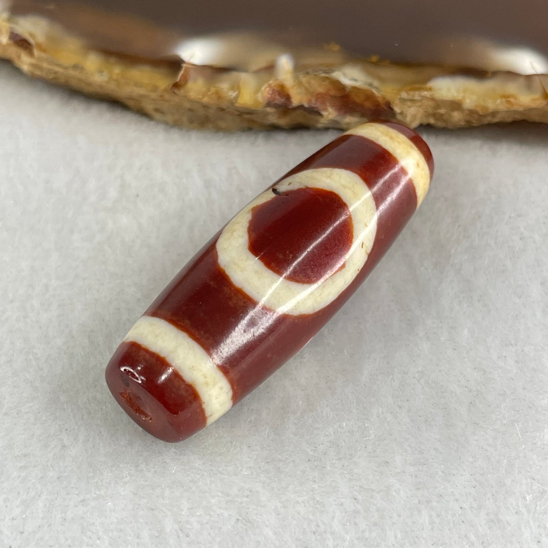 Natural Powerful Tibetan Old Oily Red White Agate One Eye Gold Metal Element Dzi Bead Heavenly Master (Tian Zhu) 一眼金天珠 9.71g 37.8 by 13.0mm - Huangs Jadeite and Jewelry Pte Ltd