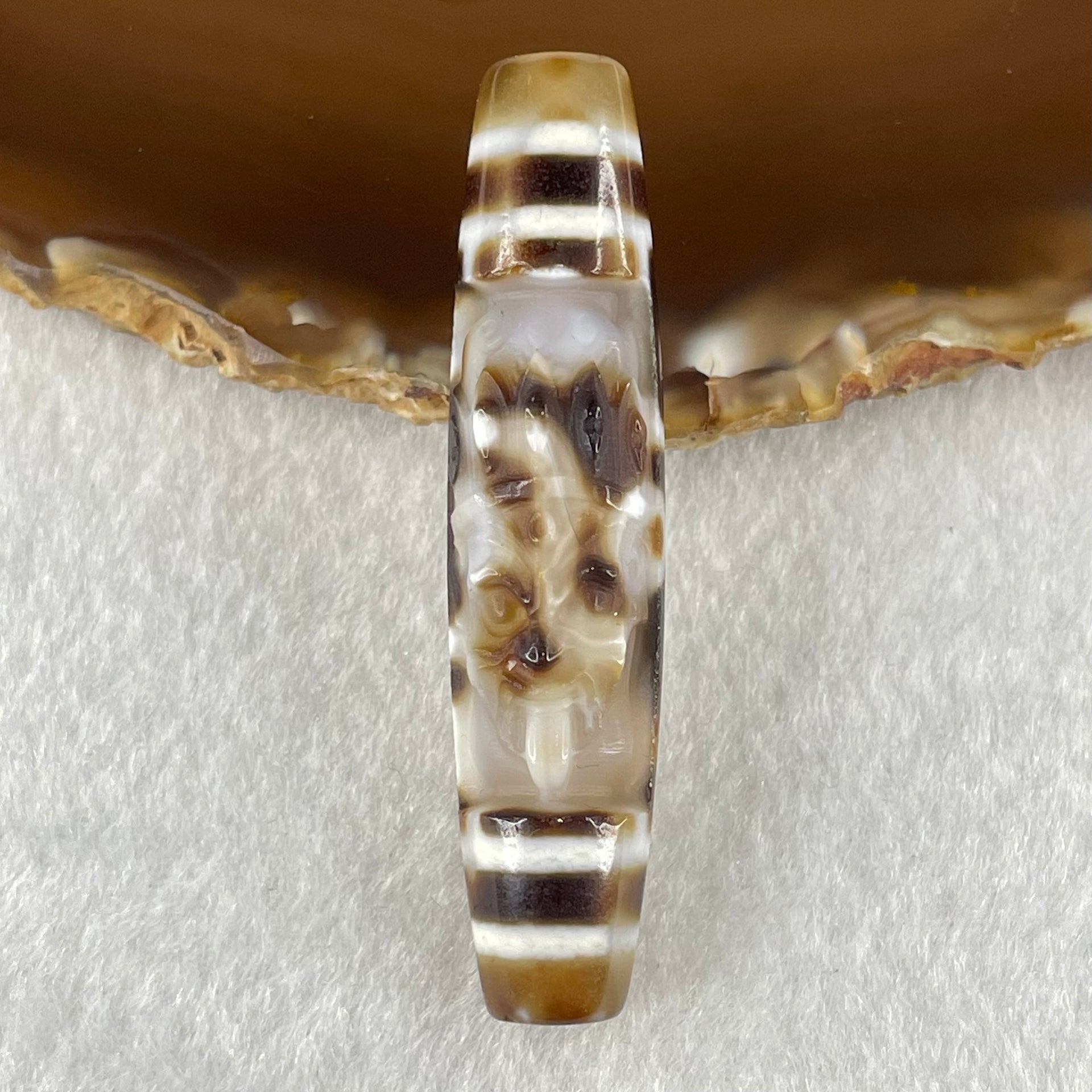 Natural Powerful Tibetan Old Oily Agate Zha Ji La Mu Female Cai Shen Carvings on 9 Eyes Dzi Bead Heavenly Master (Tian Zhu) 九眼扎基拉姆女财神天珠 13.88g 57.4 by 13.3mm - Huangs Jadeite and Jewelry Pte Ltd