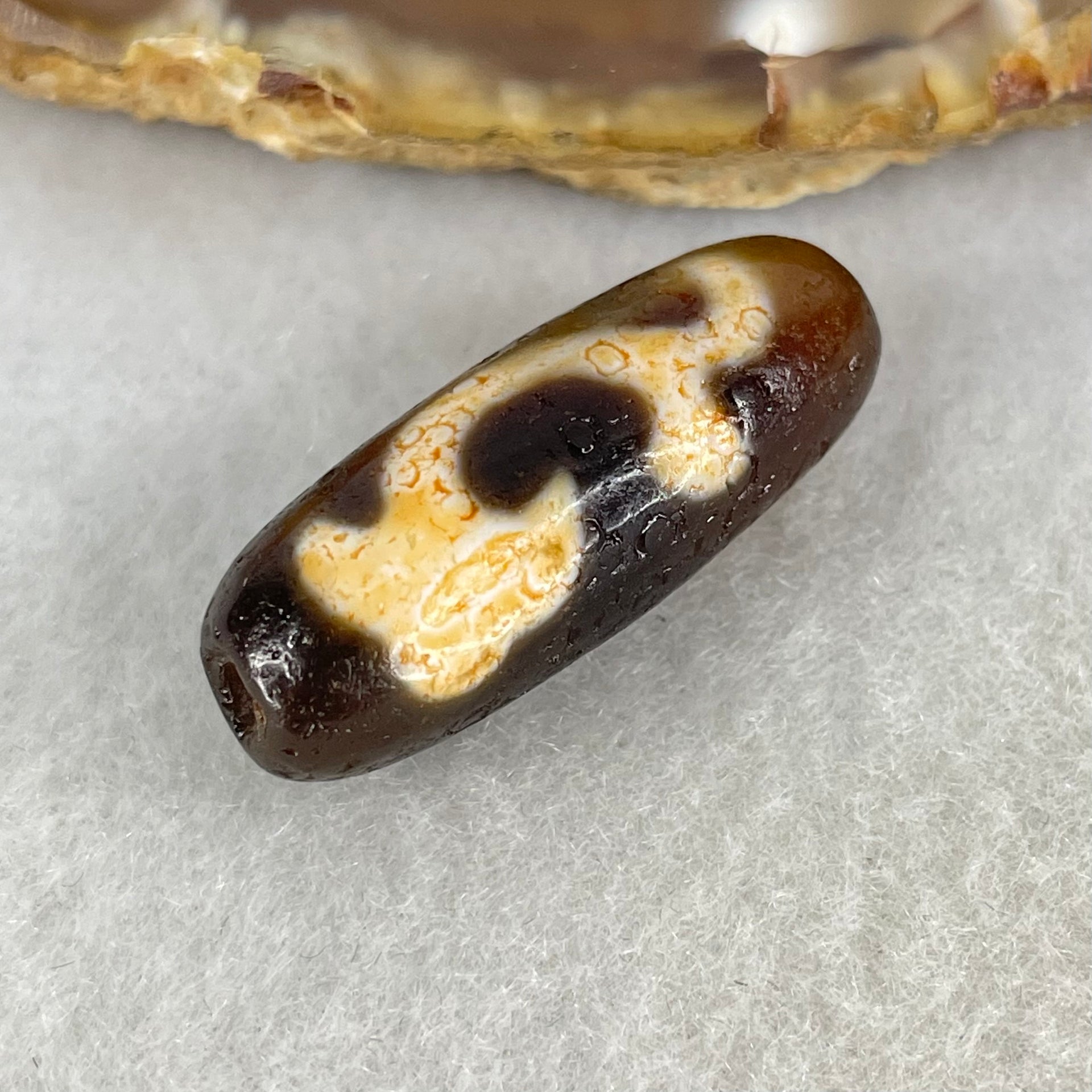 Aged Natural Powerful Tibetan Old Oily Blackish Brown Yellowish White Agate Green Tara Dzi Bead Heavenly Master (Tian Zhu) 绿度母天珠 4.86g 28.5 by 10.8mm - Huangs Jadeite and Jewelry Pte Ltd