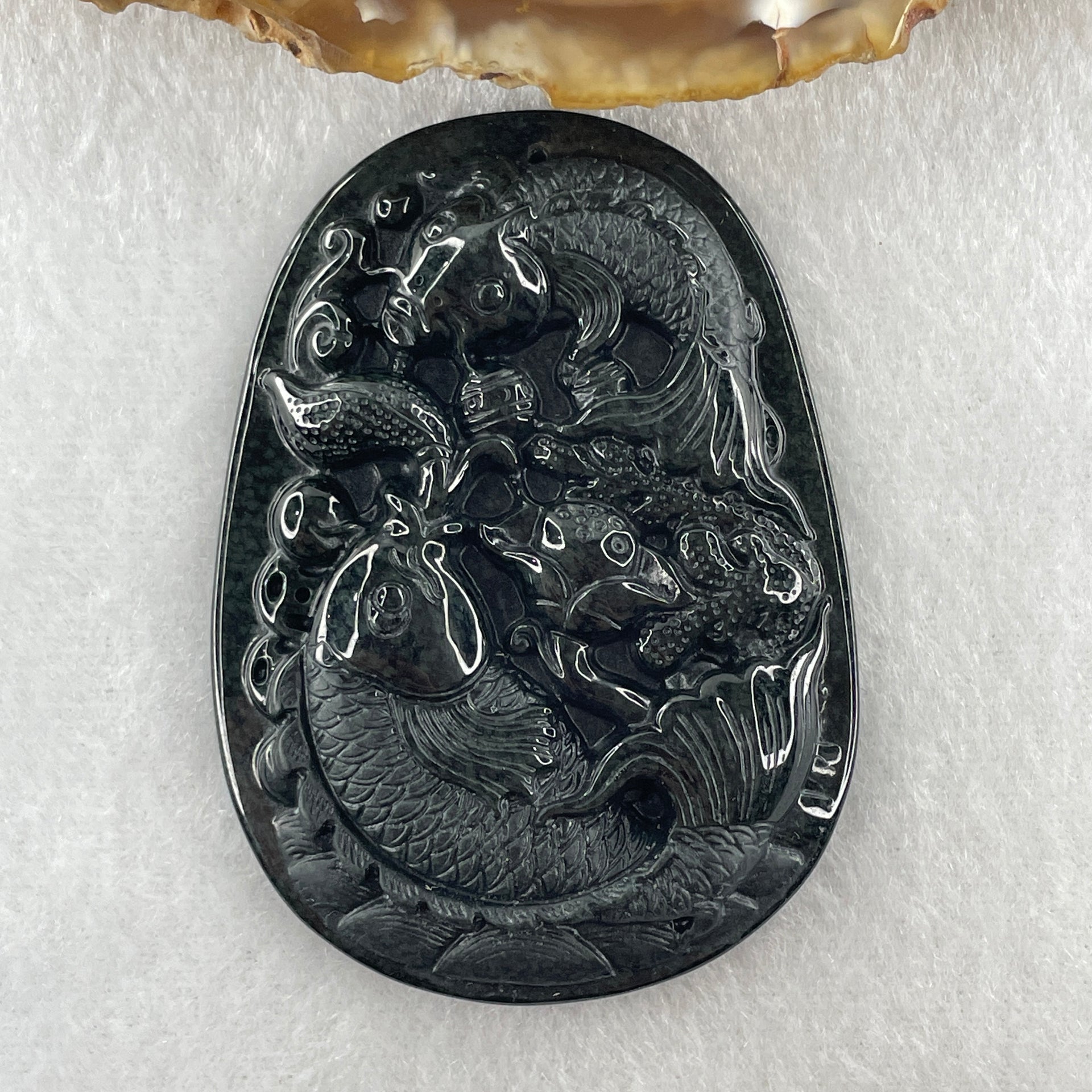 Type A Opaque to Partial Translucent Black Omphacite Jadeite Double Fish with Lotus Flower and Coins Pendant 29.11g 61.1 by 44.1 by 9.2mm - Huangs Jadeite and Jewelry Pte Ltd