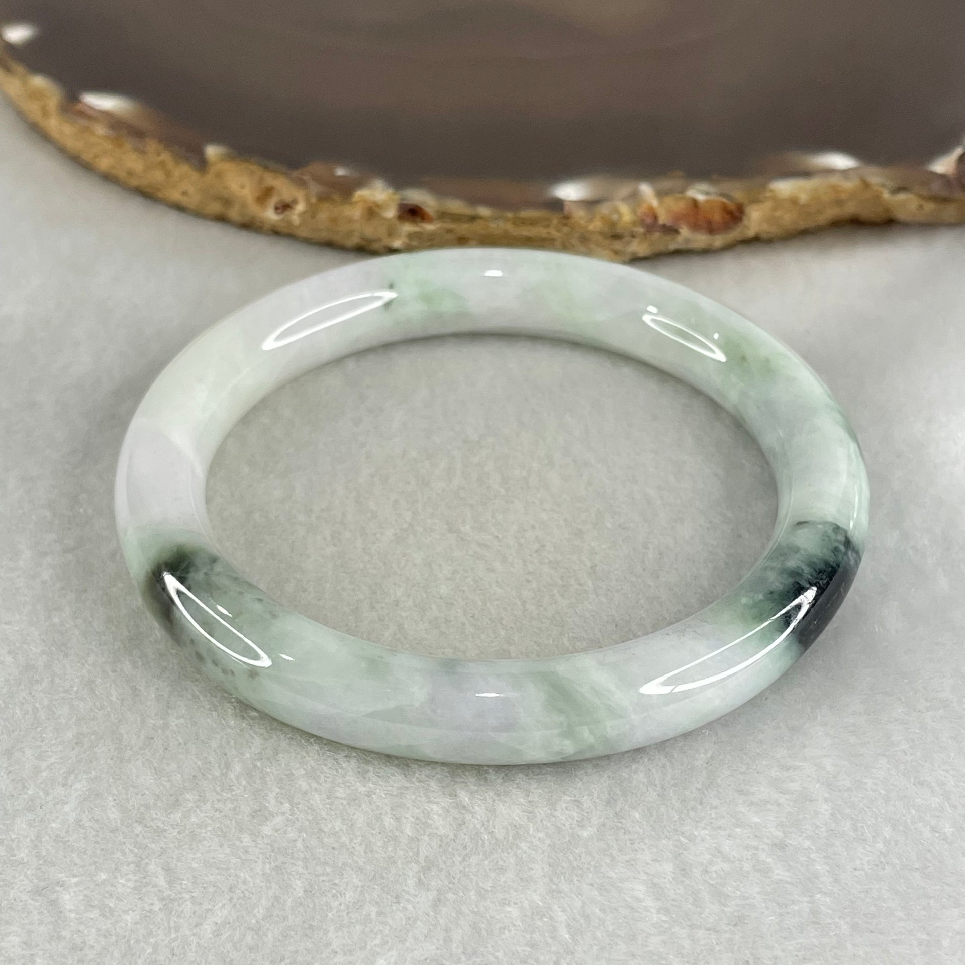 Type A Light Green with Green piao Hua Floral Jadeite Bangle 45.49g Inner Diameter 56.9mm 9.6 by 9.3mm (Internal Lines) - Huangs Jadeite and Jewelry Pte Ltd