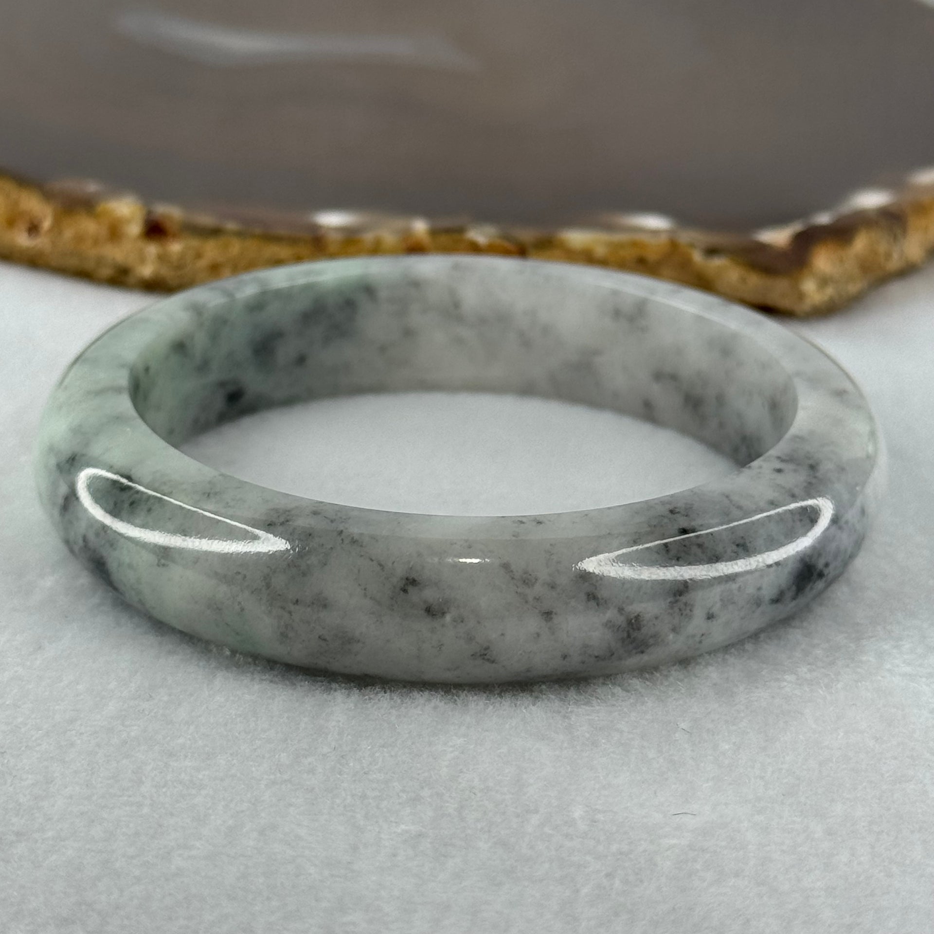 Type A Faint Green and Black Piao Hua Jadeite Bangle Internal Diameter 57.2mm 65.08g 13.4 by 8.7mm (Very Slight Internal Lines) - Huangs Jadeite and Jewelry Pte Ltd