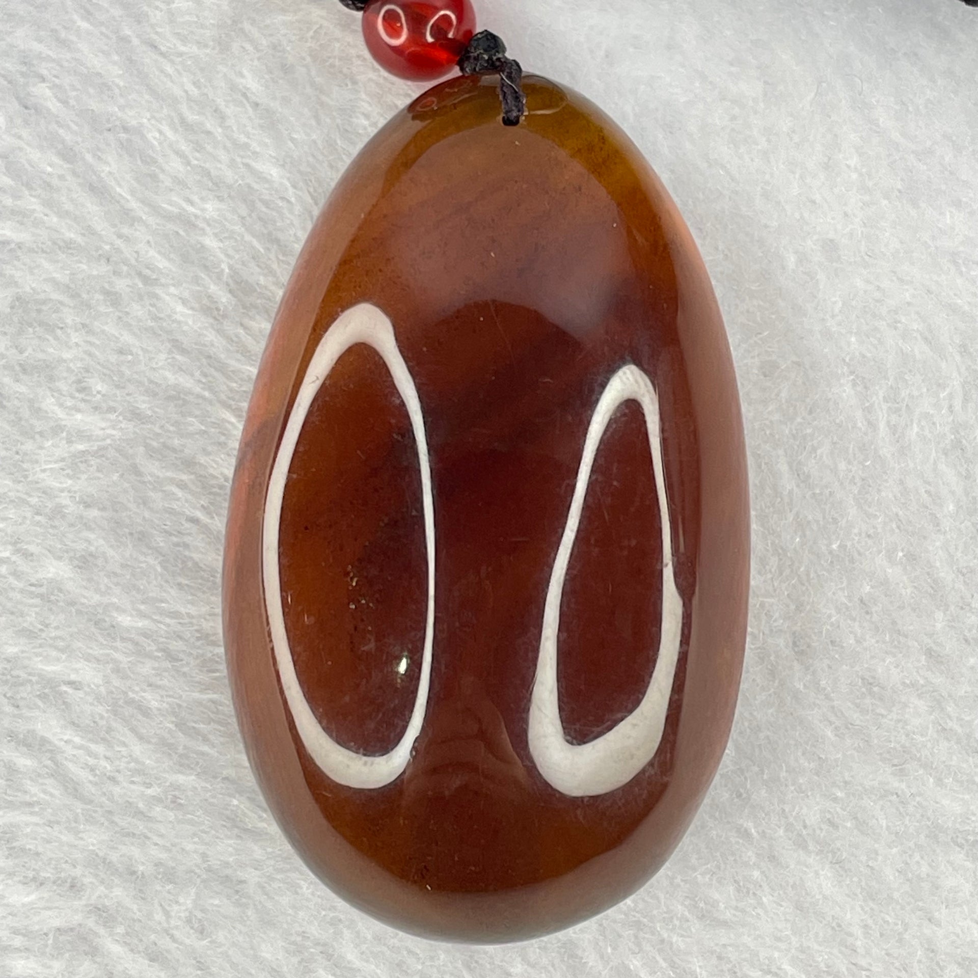 Natural Cognac with Red Amber Pendent 12.40g 51.3 by 32.7 by 20.8mm - Huangs Jadeite and Jewelry Pte Ltd