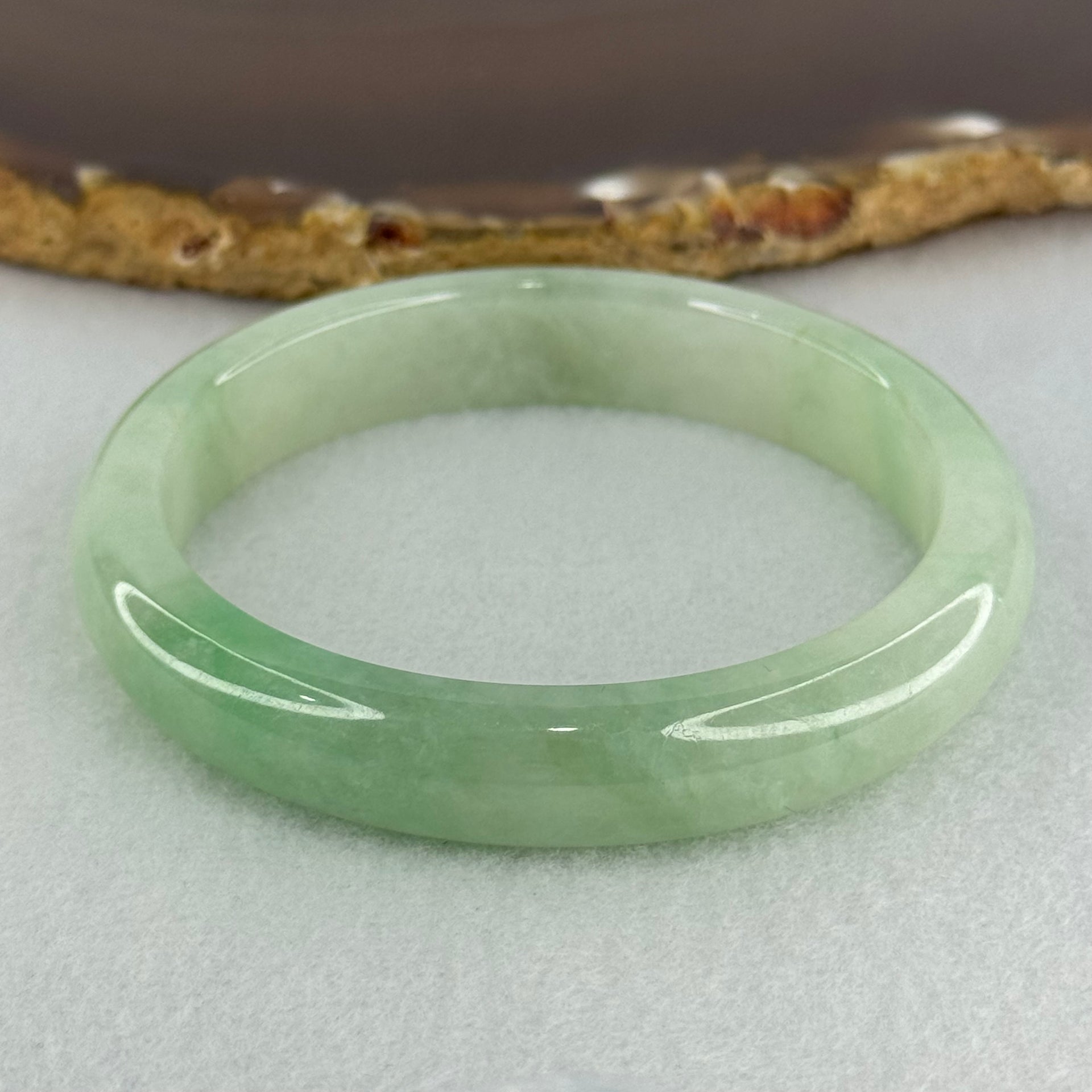 Type A Semi Icy Bright Green Jadeite Oval Bangle Internal Diameter 54.4mm 40.37g 11.3 by 8.4mm (Slight Internal Lines) - Huangs Jadeite and Jewelry Pte Ltd