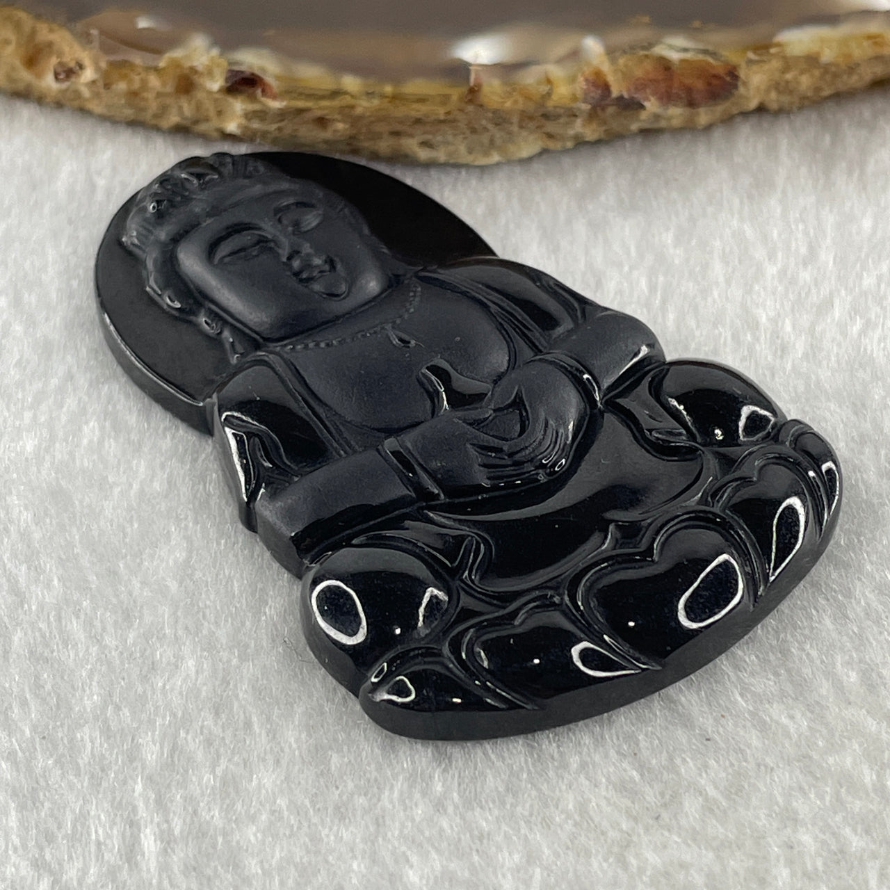Type A Opaque Black Omphacite Jadeite Guan Yin Pendant 28.39g 63.4 by 38.8 by 7.5mm - Huangs Jadeite and Jewelry Pte Ltd