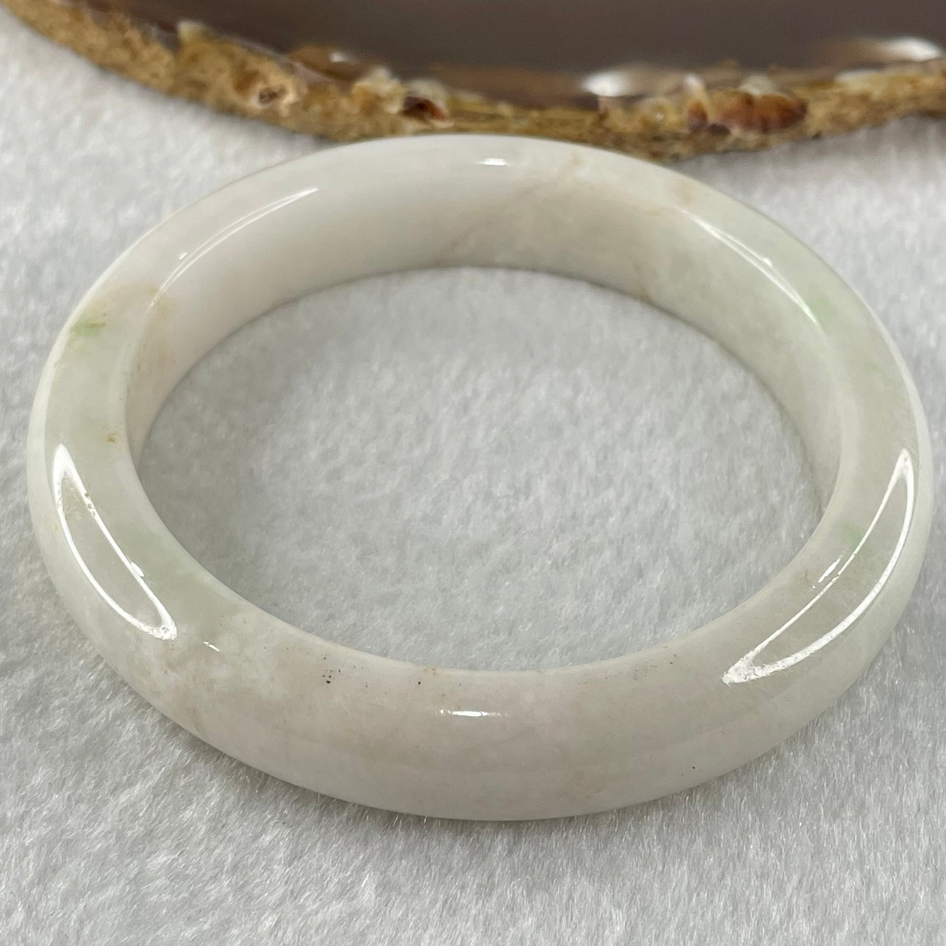 Type A Faint Lavender Green to White Jadeite Bangle 61.55g Internal Diameter 58.3mm 13.0 by 8.5mm (Slight External Roughs and Internal Lines) - Huangs Jadeite and Jewelry Pte Ltd