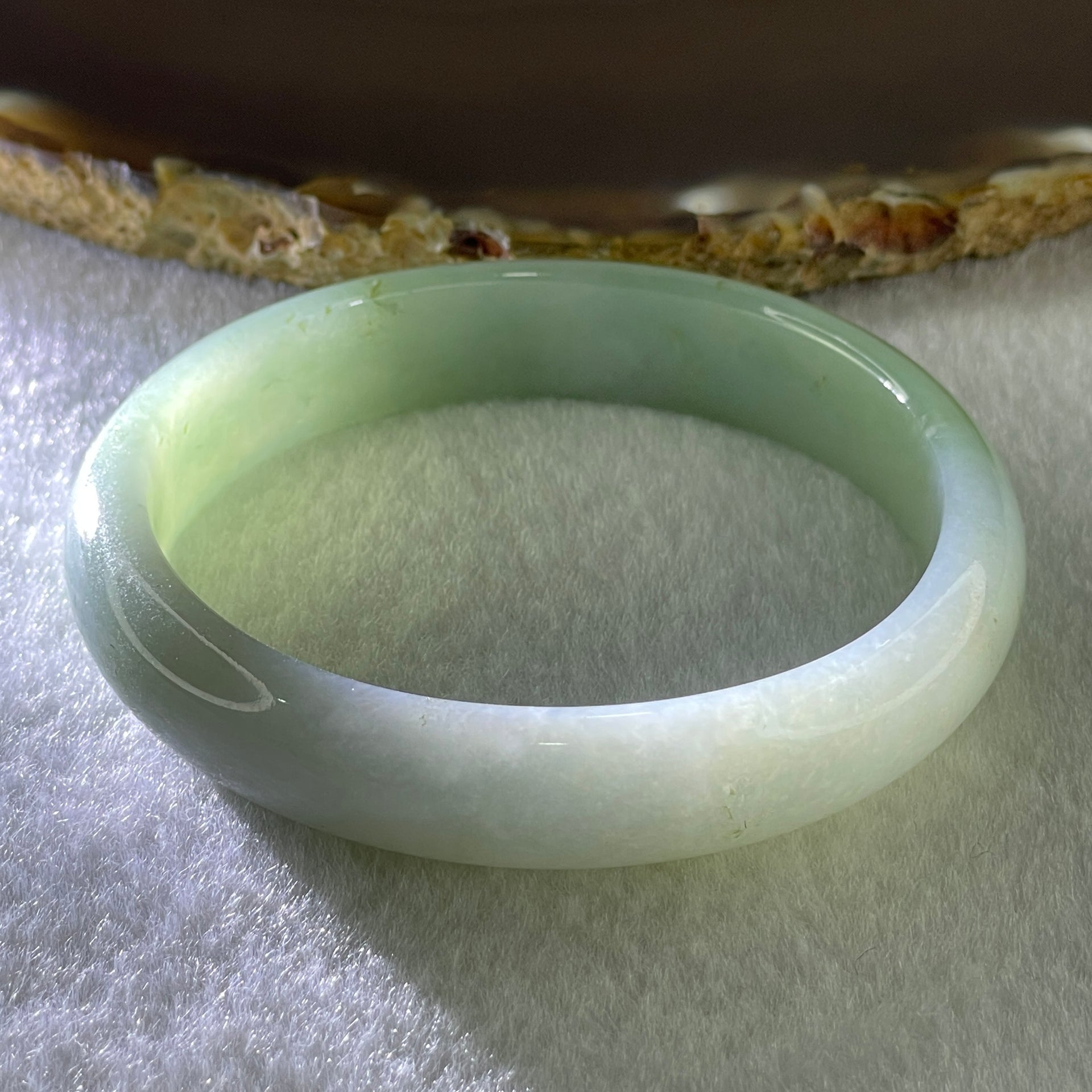 Natural Type A Jelly Light to Faint Green Jadeite Oval Bangle 36.74g Inner Diameter 55.0mm 12.0 by 6.5mm (Close to Perfect) - Huangs Jadeite and Jewelry Pte Ltd