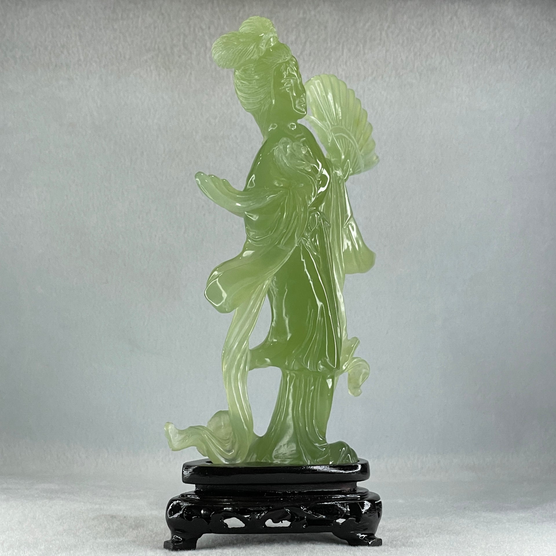 Natural Green Serpentine Fairy with Fan and Flower with Wooden Stand Display 476.2g 130.0 by 70.0 by 225.0mm - Huangs Jadeite and Jewelry Pte Ltd