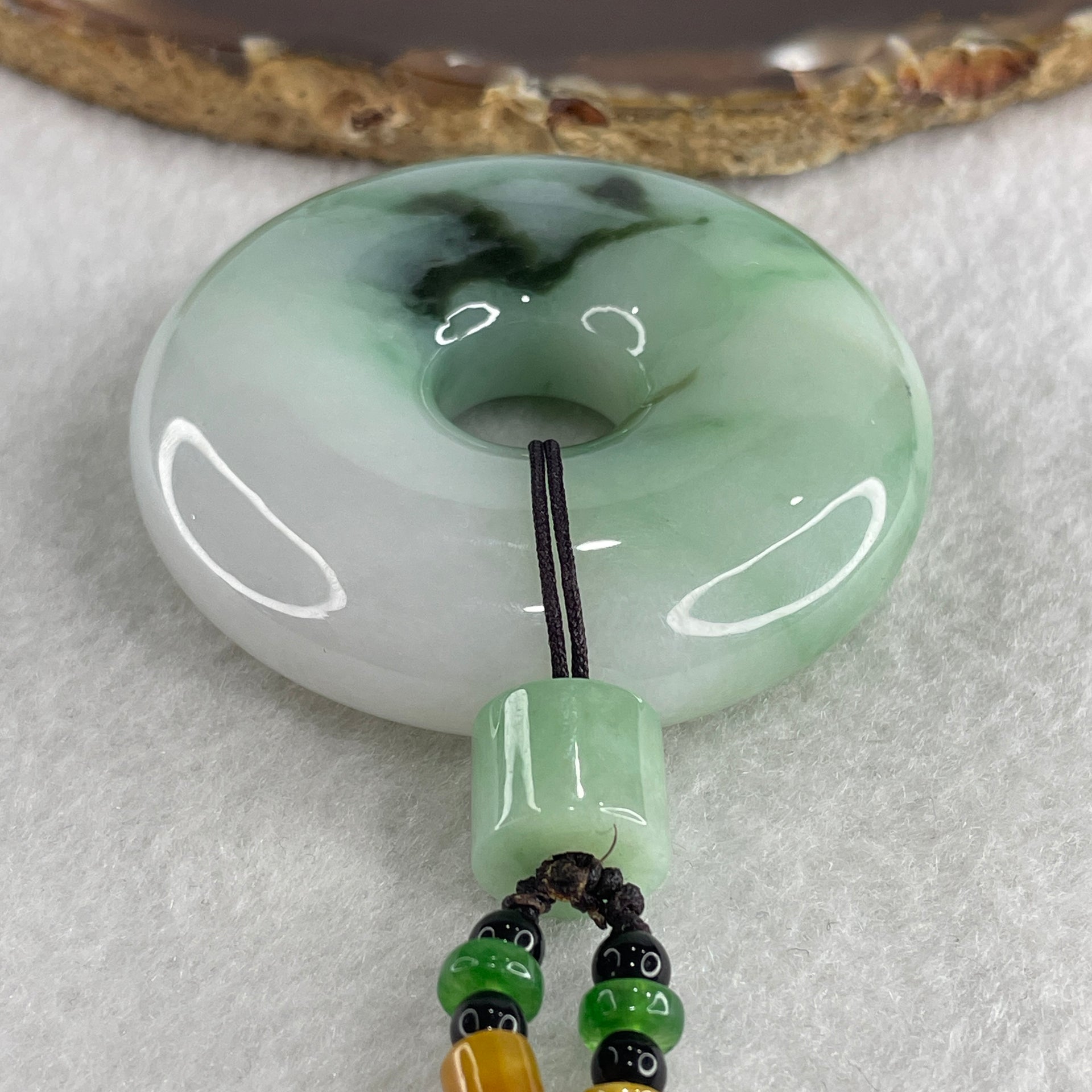 Natural Type A Green with Emerald Green and Lavender Piao Hua Jadeite Donut Pendant 91.56g 54.8 by 14.0mm - Huangs Jadeite and Jewelry Pte Ltd