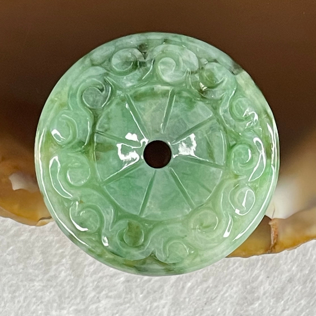 Type A Light Green with Emerald Green Jadeite Ping An Kou Donut with Flora Carvings Pendant 5.81g 14.6 by 5.4mm - Huangs Jadeite and Jewelry Pte Ltd