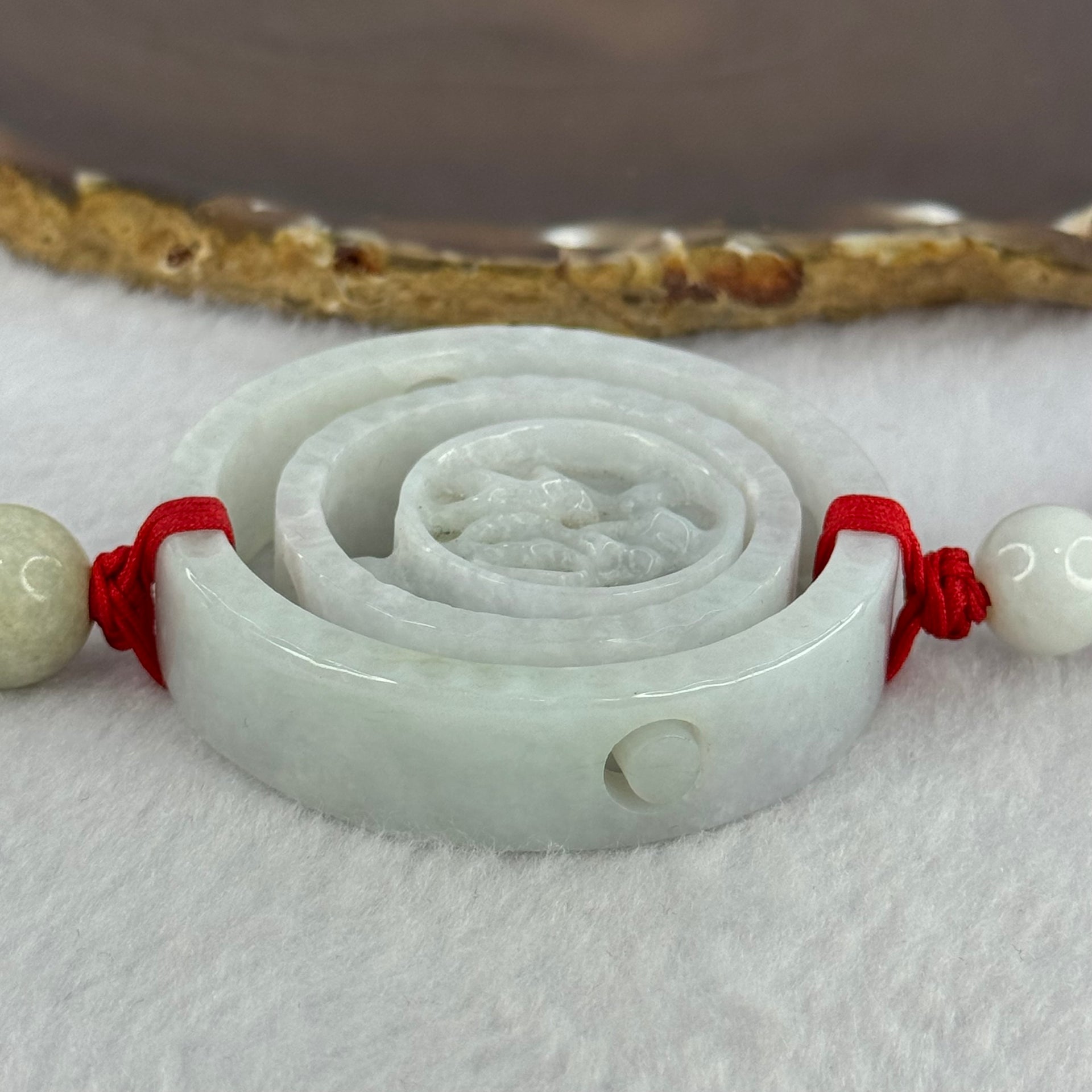 Type A Green Jadeite 3 Tiers Movable Ping An Kou Donut Display 54.49g 55.3 by 13.0mm - Huangs Jadeite and Jewelry Pte Ltd