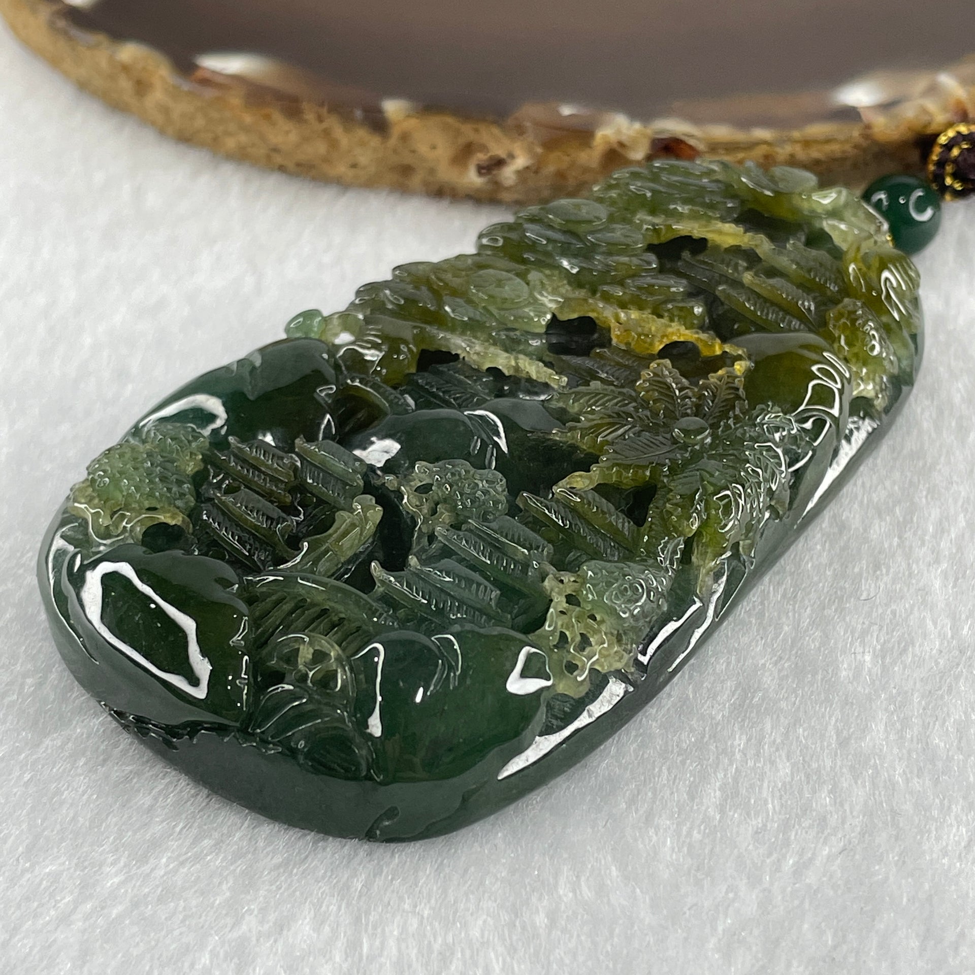 Grand Master Type Green with Brownish Yellow Jadeite Shan Shui with Gui Ren Pendant 112.63g 80.3 by 46.8 by 13.0mm - Huangs Jadeite and Jewelry Pte Ltd