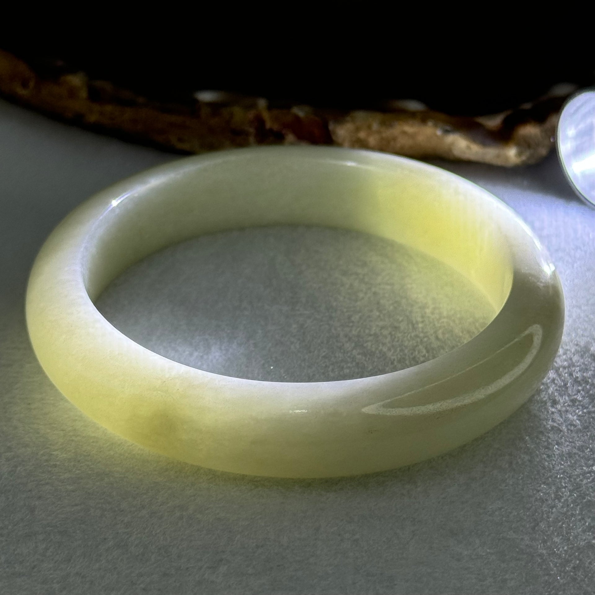 Type A Light Green Jadeite Bangle Internal Diameter 57.5mm 57.45g 12.8 by 8.4mm (Very Slight External Rough) - Huangs Jadeite and Jewelry Pte Ltd