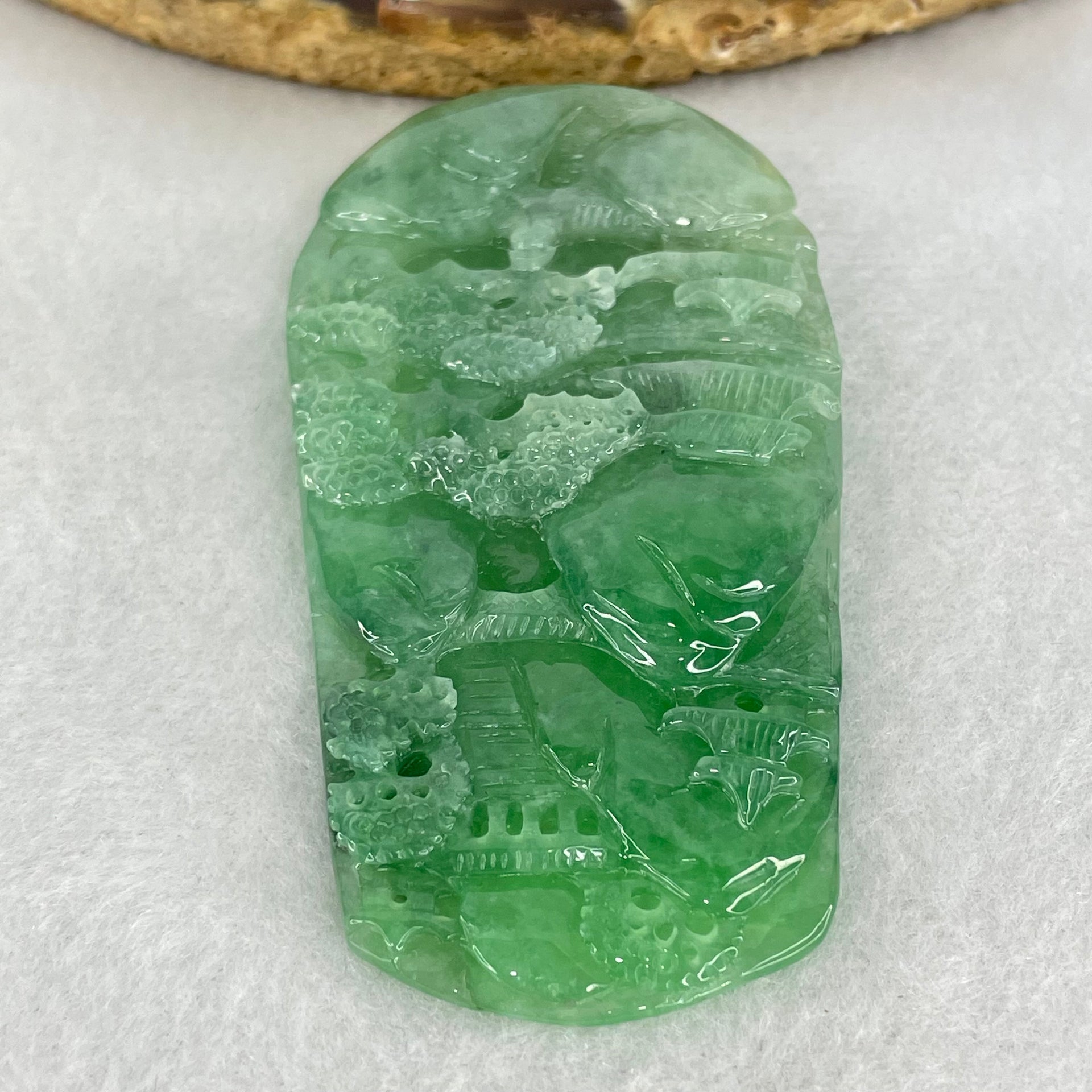 Type A Semi Icy Bright Green Jadeite Double Sided Shan Shui with Gui Ren Benefactor Pendant 47.64g 76.5 by 39.9 by 9.0mm - Huangs Jadeite and Jewelry Pte Ltd