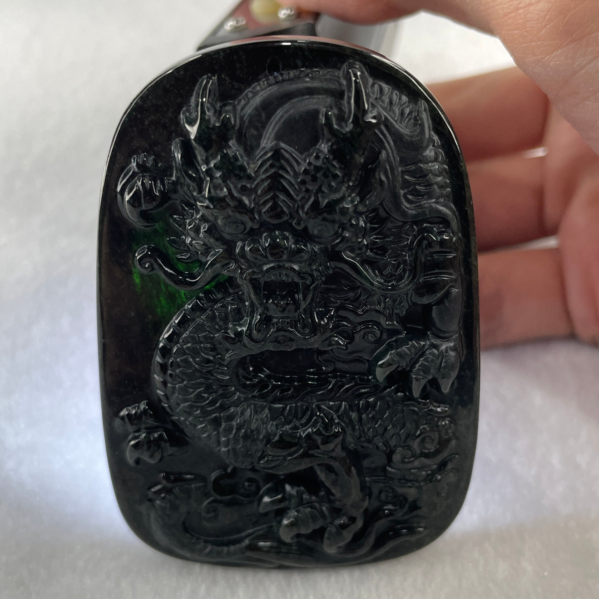 Type A Opaque to Partial Translucent Black Omphacite Jadeite Dragon Pendant 34.19g 66.8 by 45.5 by 9.4mm - Huangs Jadeite and Jewelry Pte Ltd