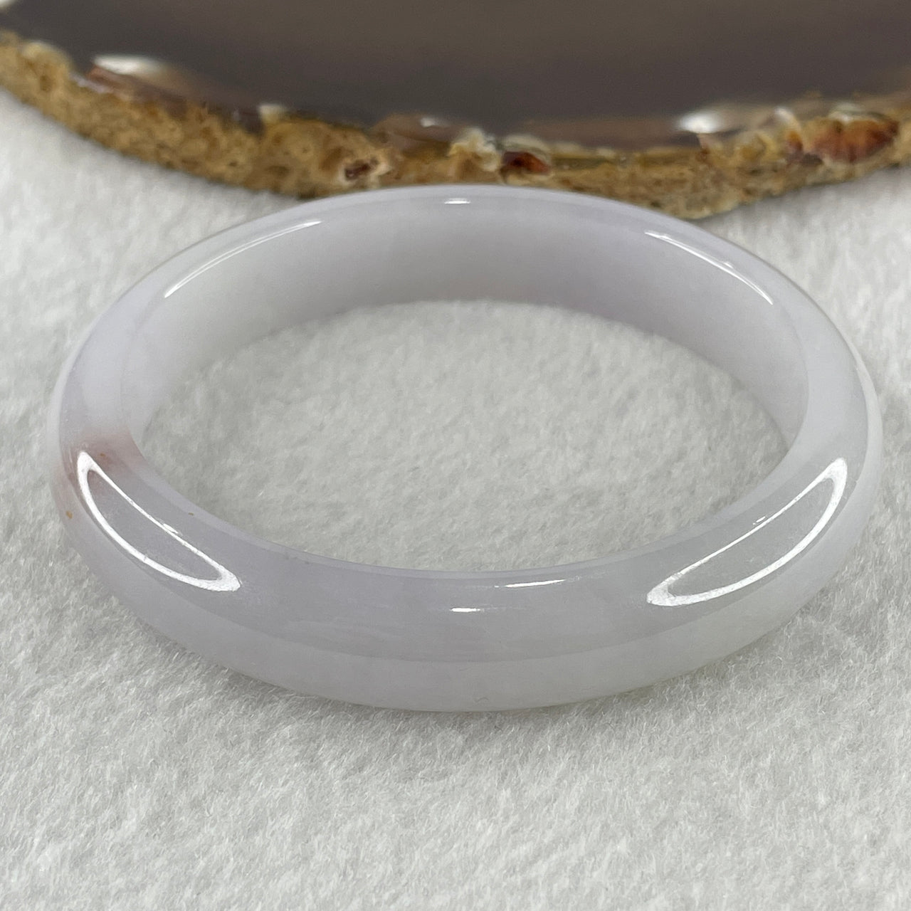 Certified Type A Light Green with Reddish Spot Jadeite Oval Bangle Internal Diameter 56.1mm 40.67g 11.2 by 7.3mm (Slight Internal Lines)