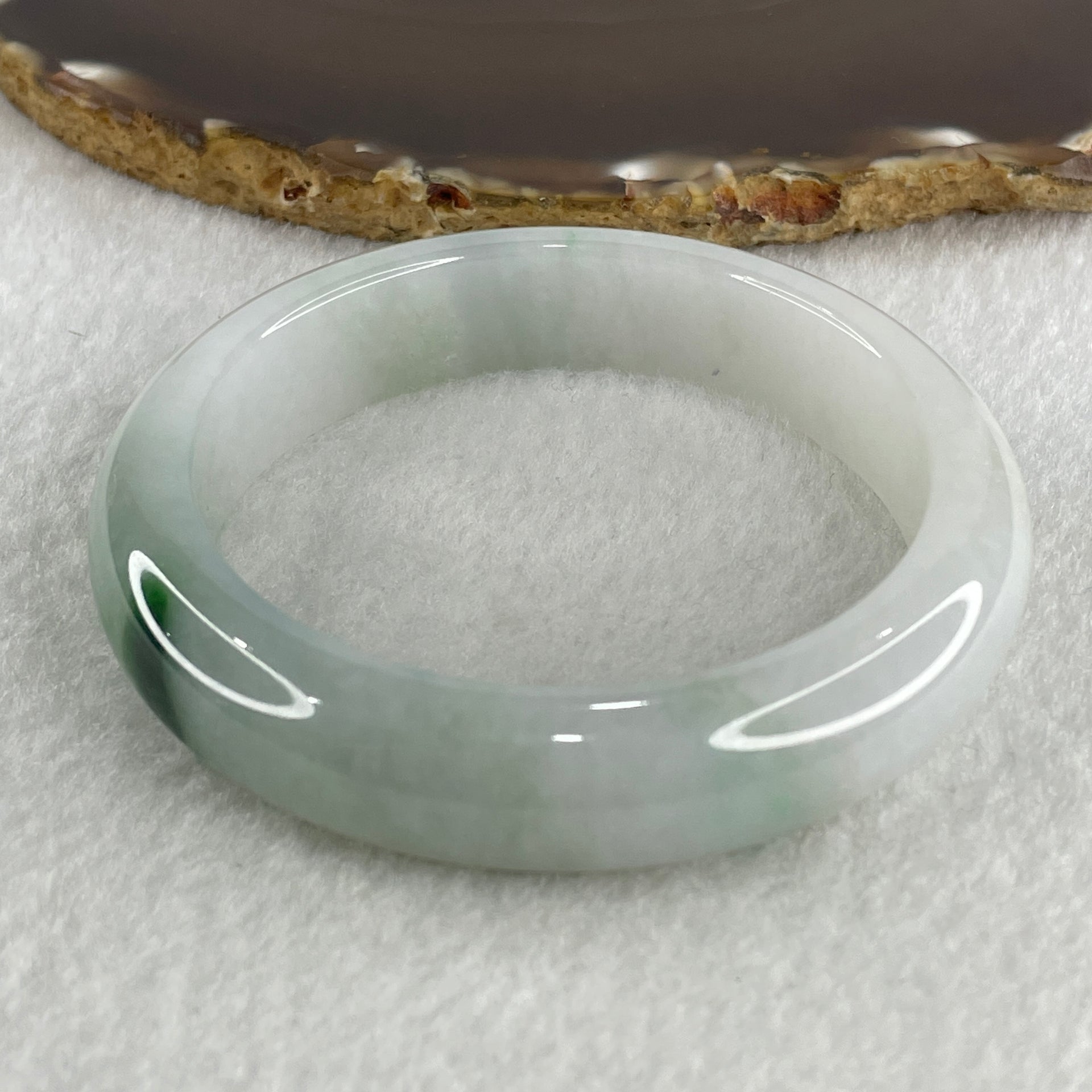 Type A Natural Jelly Light Green with Faint Lavender with Spicy Green Spot Jadeite Bangle 70.15g Inner Diameter 57.8mm 14.3 by 9.6mm (Close to Perfect) - Huangs Jadeite and Jewelry Pte Ltd