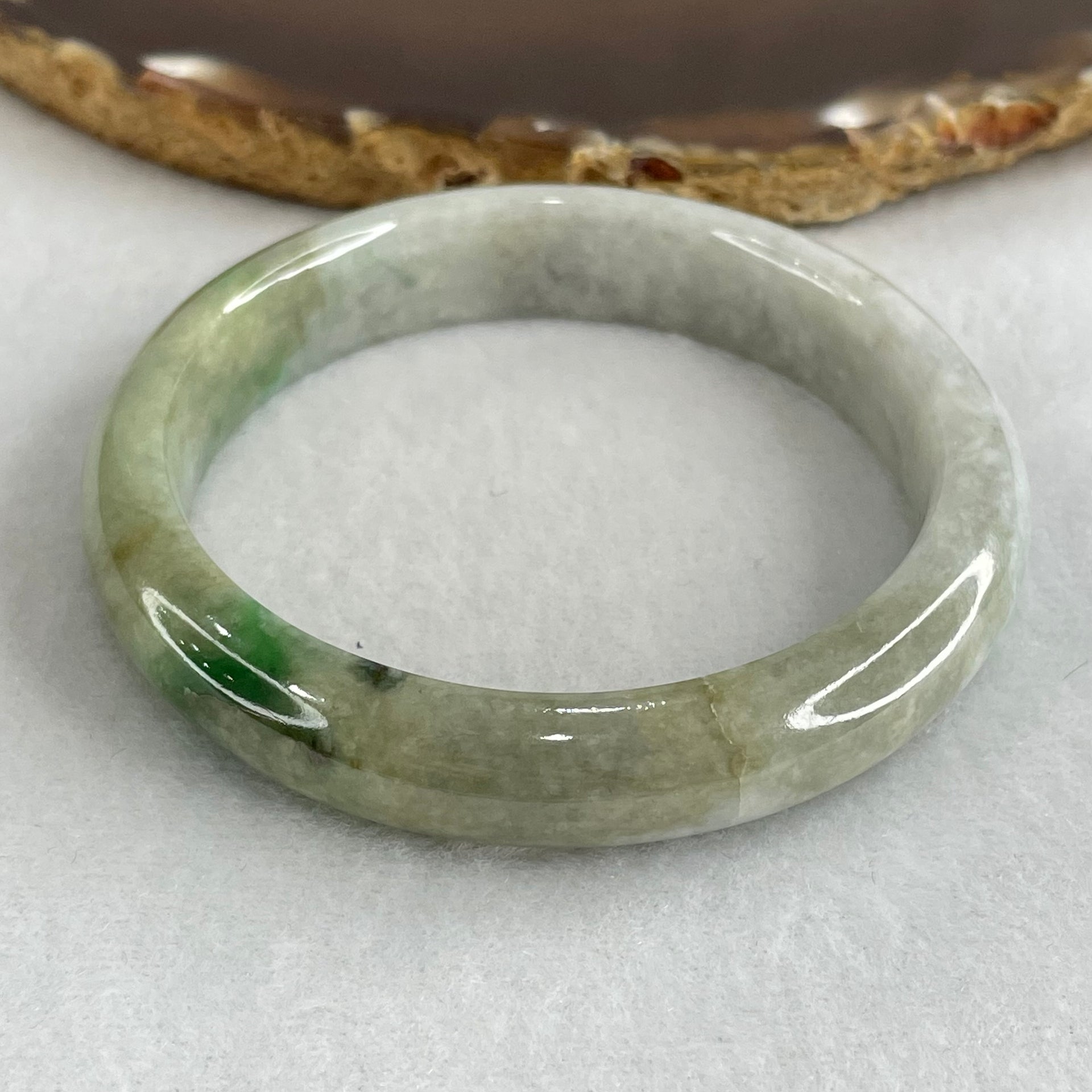 Type A Light Blueish Green with Spicy Green Piao Hua Jadeite Bangle 46.76g Inner Diameter 56.9mm 11.8 by 8.0mm (External Line with Very Slight Internal Lines) - Huangs Jadeite and Jewelry Pte Ltd