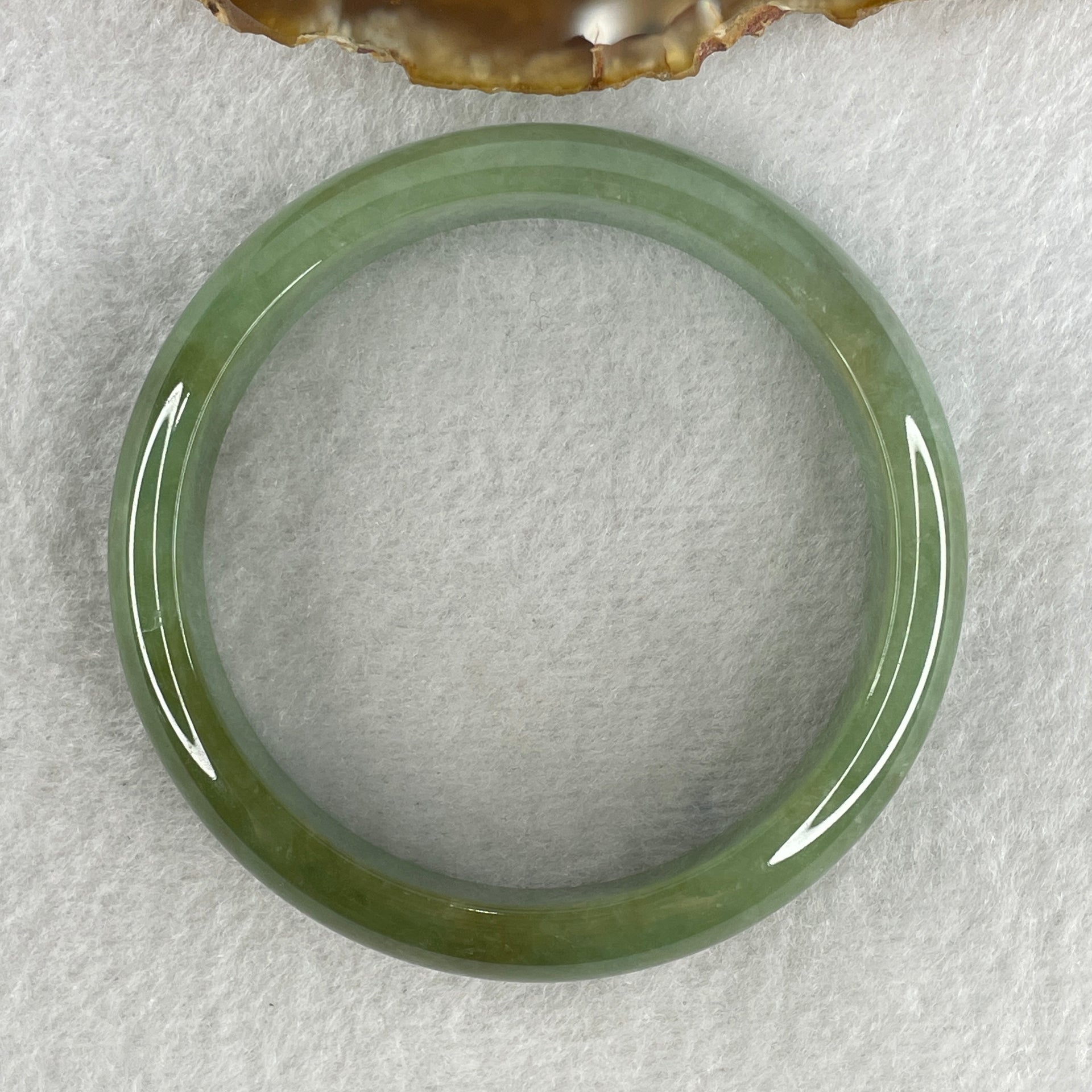 Type A Natural Jelly Green with Brownish Piao Hua Jadeite Bangle 49.14g Inner Diameter 57.2mm 13.1 by 7.3mm (Close to Perfect) - Huangs Jadeite and Jewelry Pte Ltd