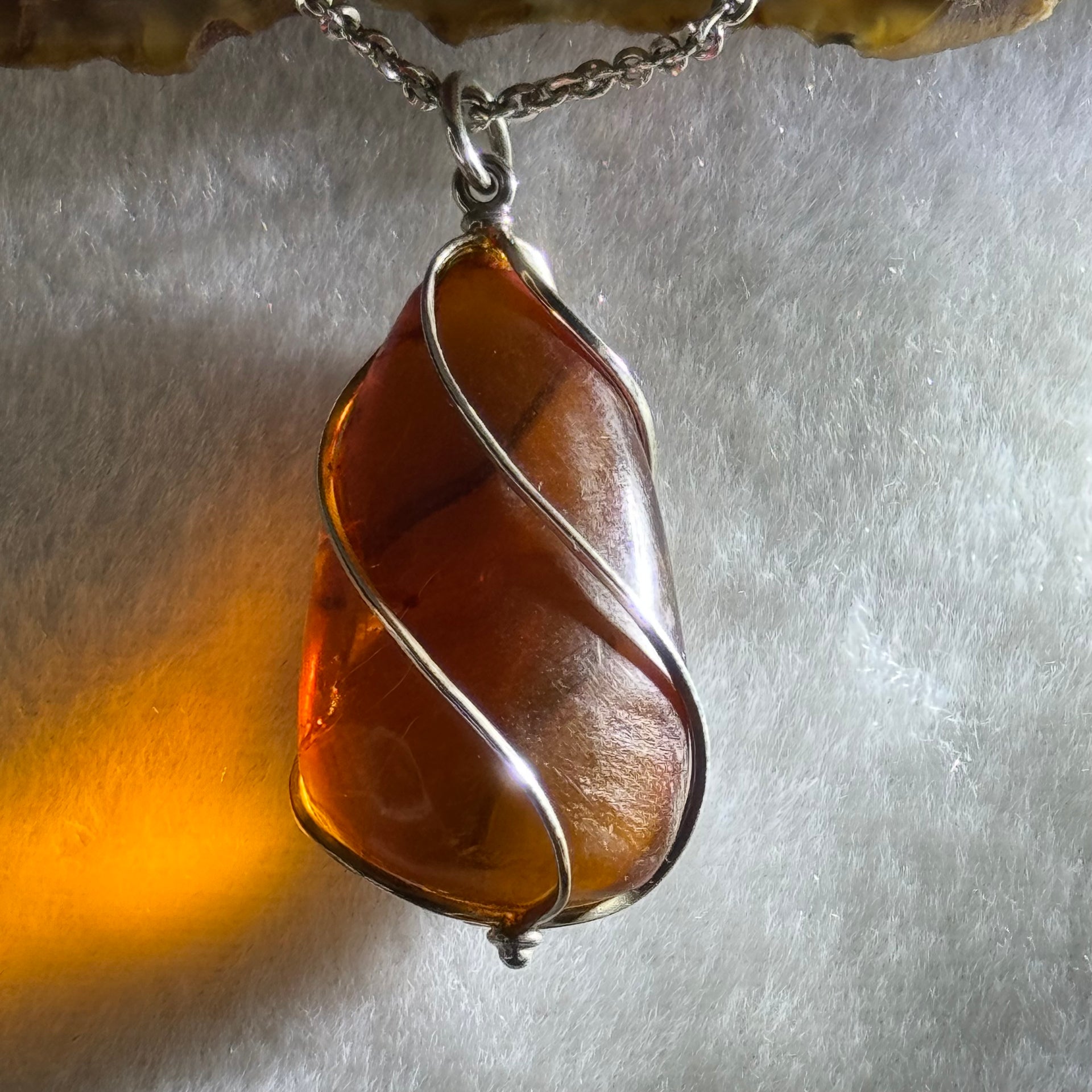 Natural Amber in S925 Sliver Necklace 11.95g 33.5 by 19.4 by 14.5mm - Huangs Jadeite and Jewelry Pte Ltd