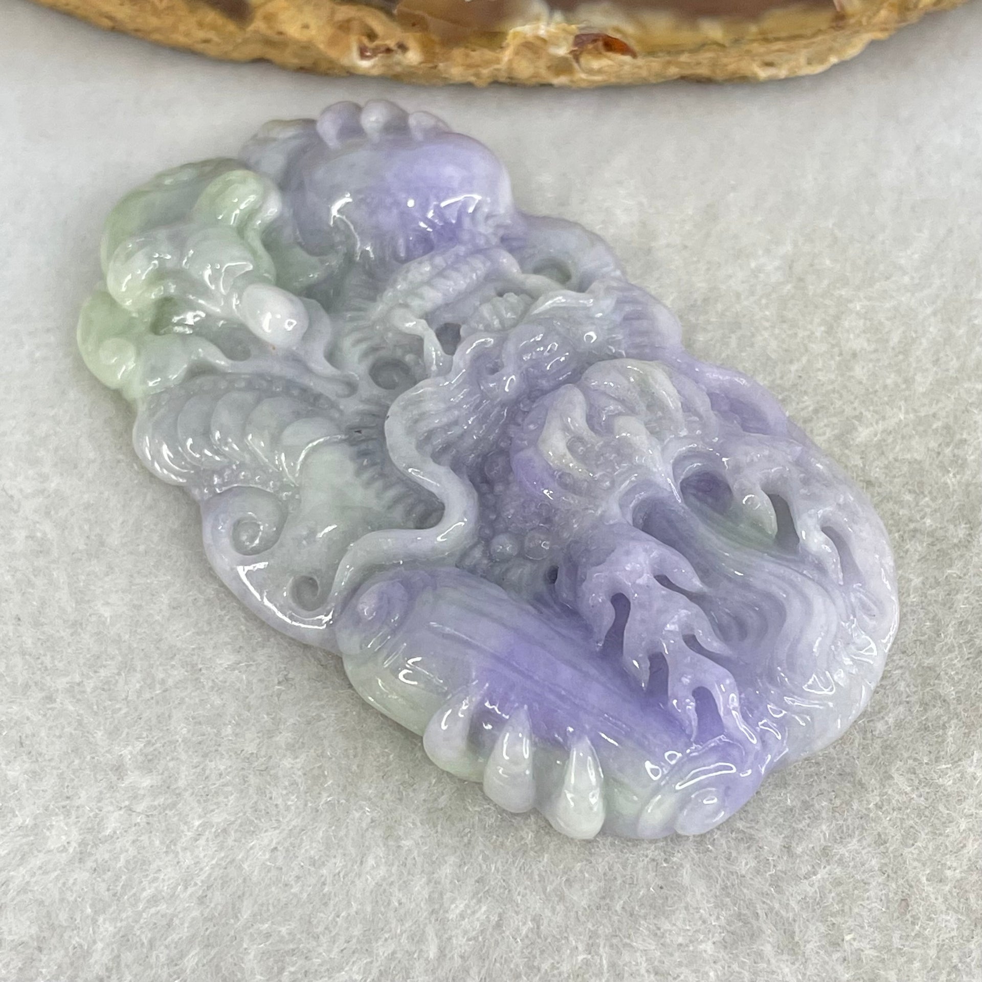 Type A Bright Intense Lavender Green Jadeite Double Sided Dragon with Benefactor Pendant 39.73g 65.0 by 37.4 by 9.8mm - Huangs Jadeite and Jewelry Pte Ltd