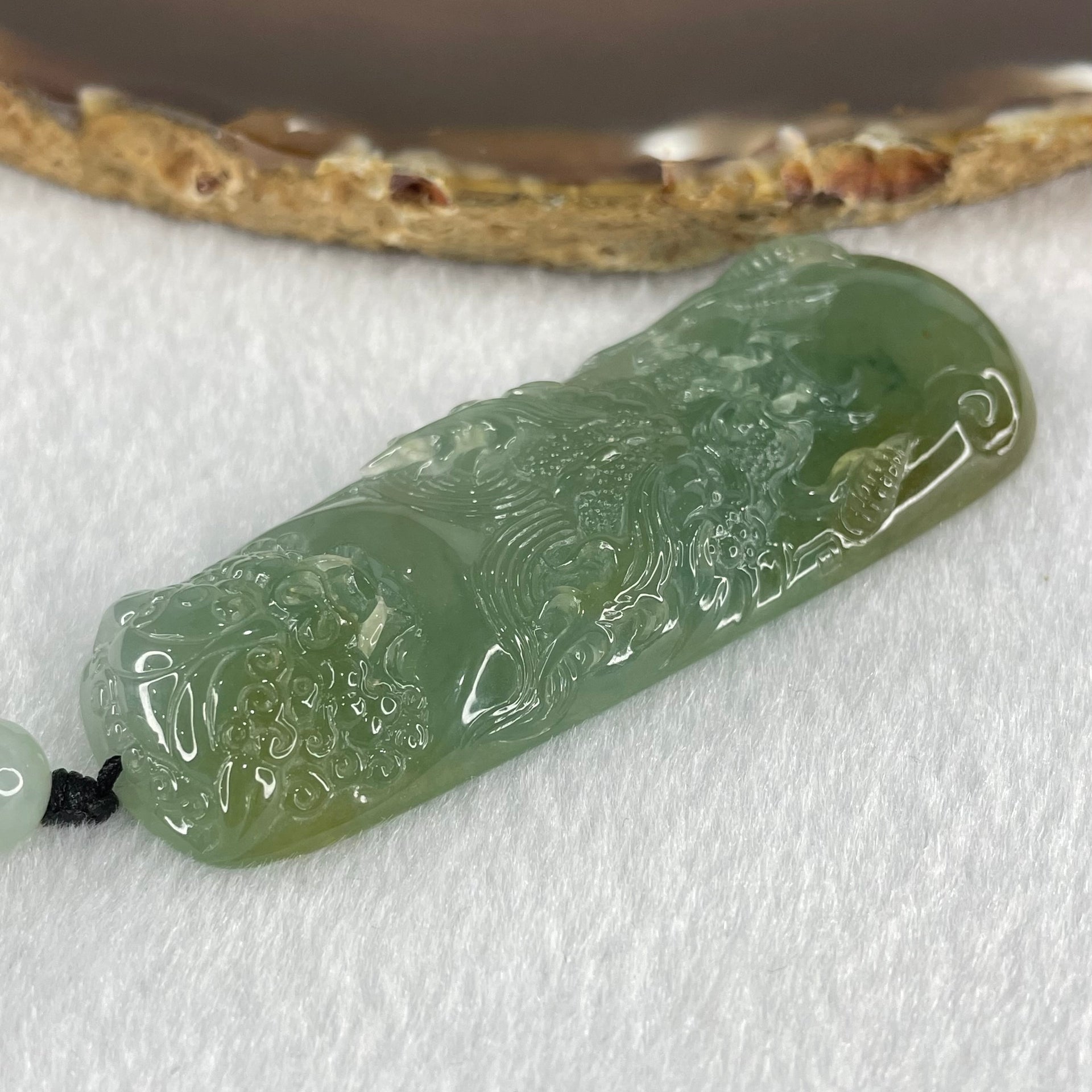 Grandmaster Type A Icy Blueish Green Jadeite Fu Gou on Dragon Pendant 30.95g 68 by 25 by 9.3mm - Huangs Jadeite and Jewelry Pte Ltd