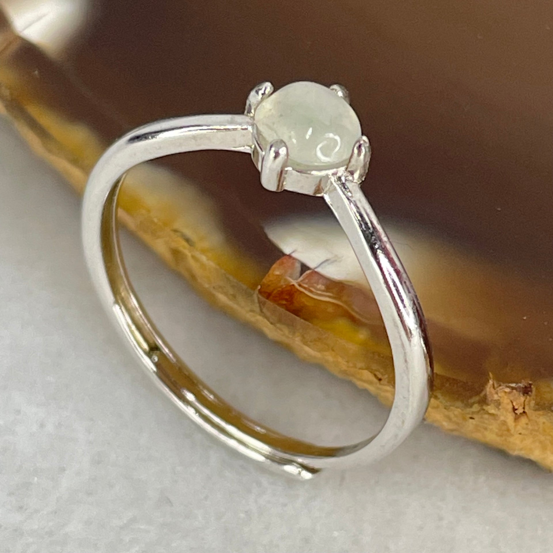 Type A Icy Faint Green Cabochon Jadeite in S925 Sliver Ring (Adjustable Size) 1.05g 4.5 by 3.0mm - Huangs Jadeite and Jewelry Pte Ltd