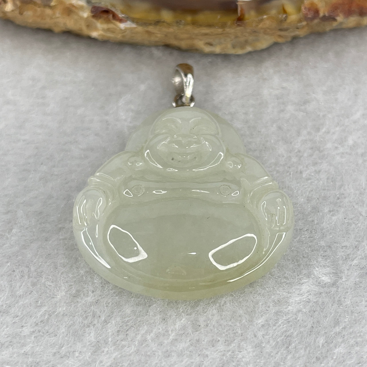 Natural Type A Faint Yellowish to Colorless Jadeite Milo Laughing Buddha with 18K White Gold Clasp Pendant 9.25g 28.3 by 25.9 by 7.3mm