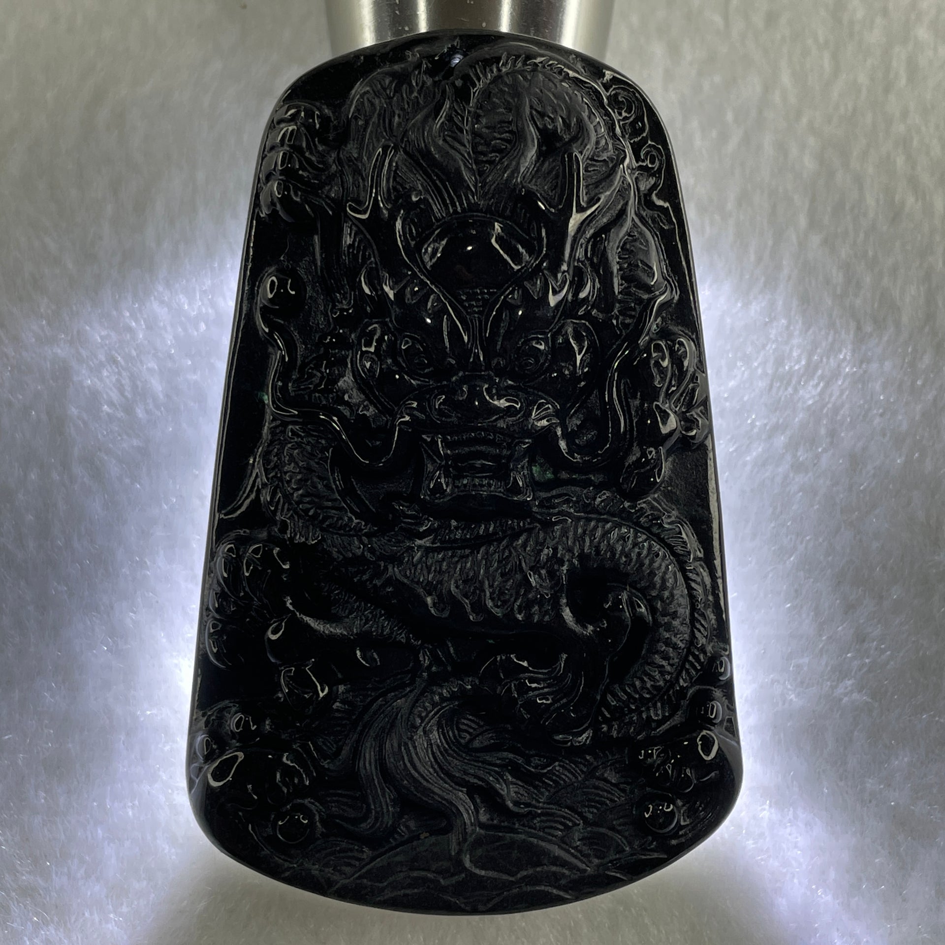 Type A Opaque to Partial Translucent Black Omphacite Jadeite Dragon Pendant 32.91g 66.0 by 42.2 by 9.5mm - Huangs Jadeite and Jewelry Pte Ltd