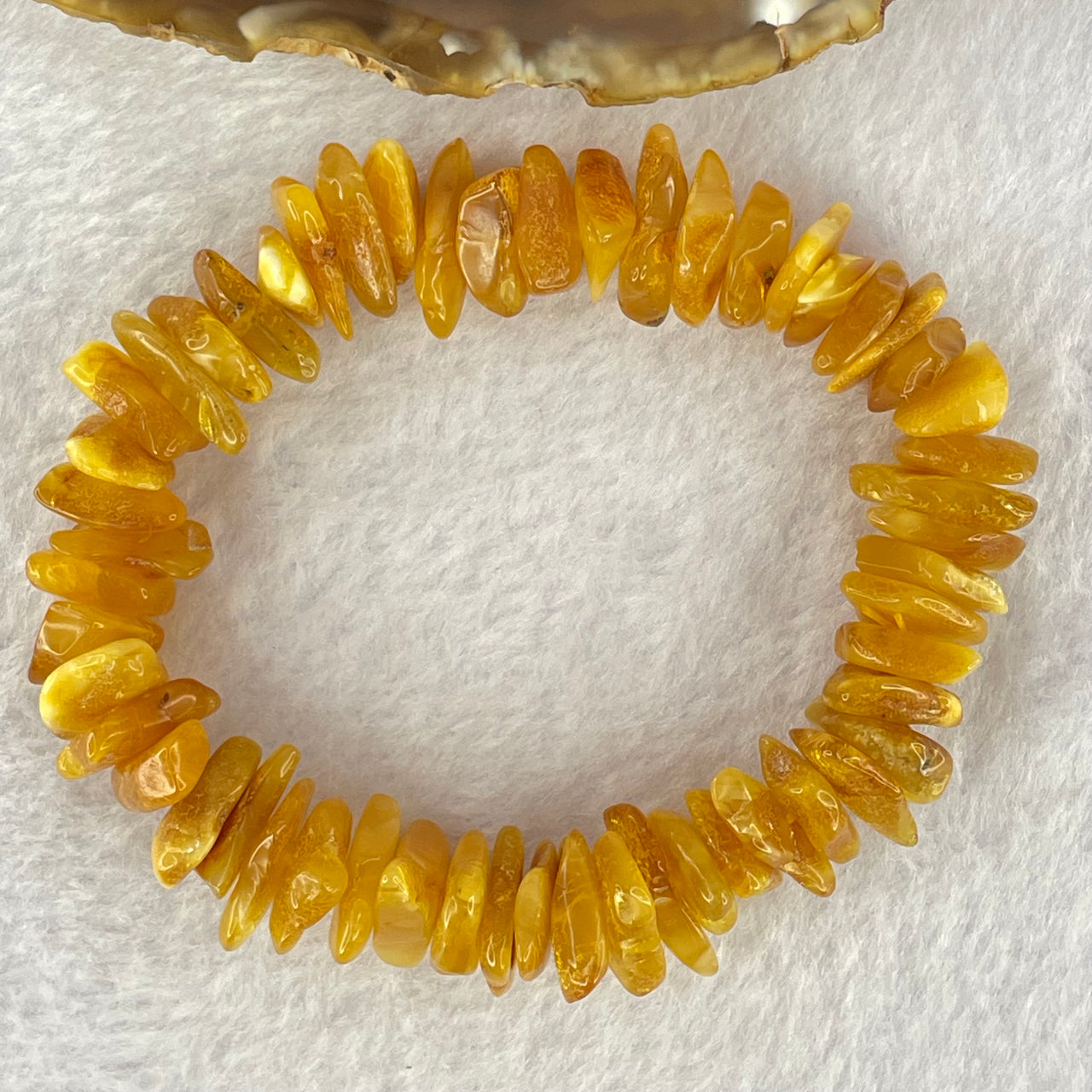 Natural Beeswax Raw Stone Irregular Beads Bracelet 天然蜜蜂蜡原石手链 17.97g 17cm 12.5 by 9.2 by 5.3mm 12.9 by 9.3 by 4.5mm 55pcs - Huangs Jadeite and Jewelry Pte Ltd