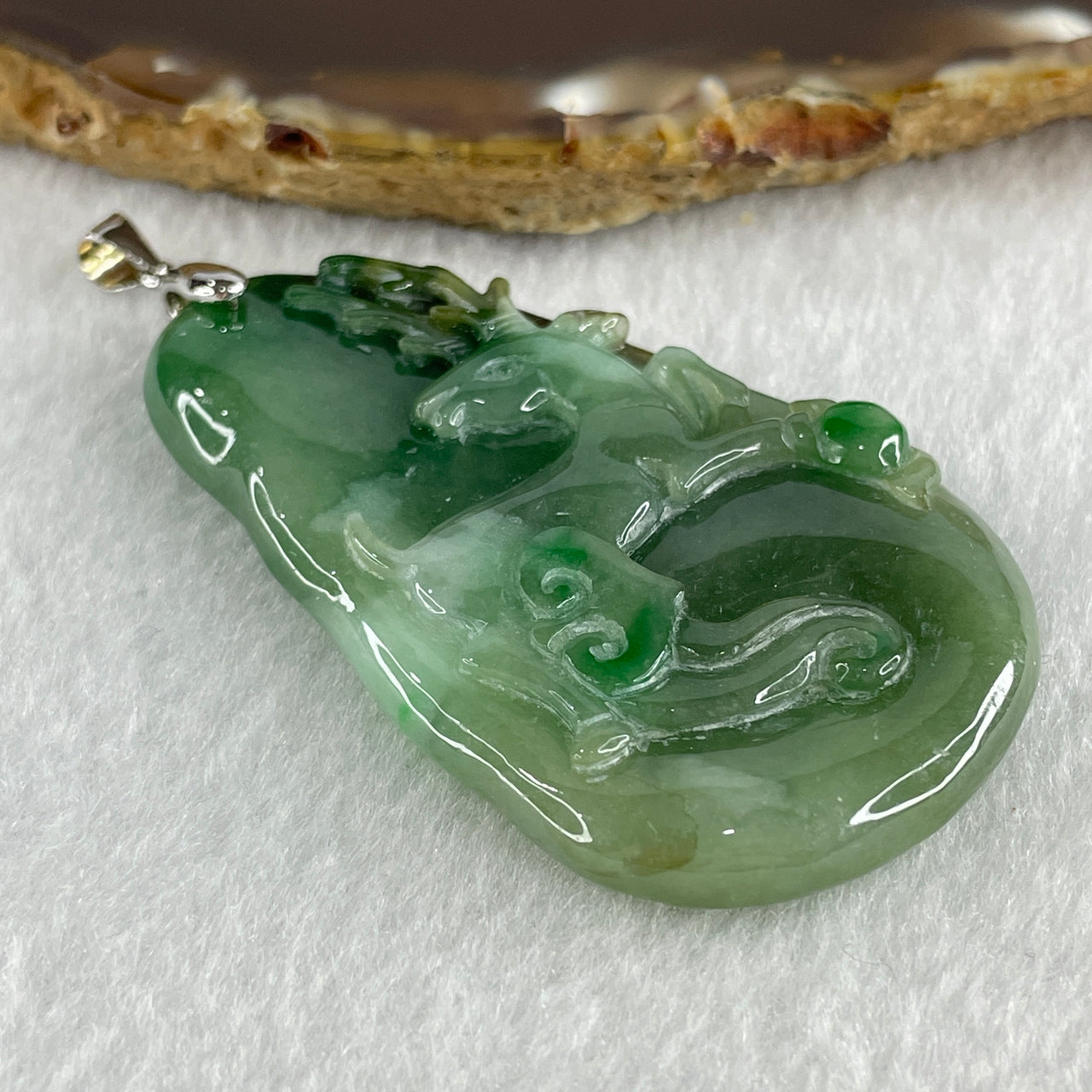 Natural Type A Green with Emerald Green and Brown Patches Jadeite Deer and Ruyi Pendant in S925 Silver Clasp 27.01g 57.9 by 35.5 by 6.5mm