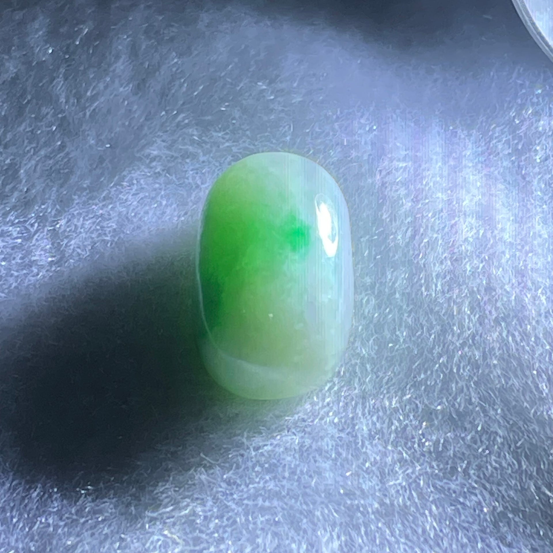 Type A Light Green with Apple Green Patches Jadeite Oval Cabouchon Stone For Setting 2.90g 17.2 by 10.2 by 7.7mm - Huangs Jadeite and Jewelry Pte Ltd