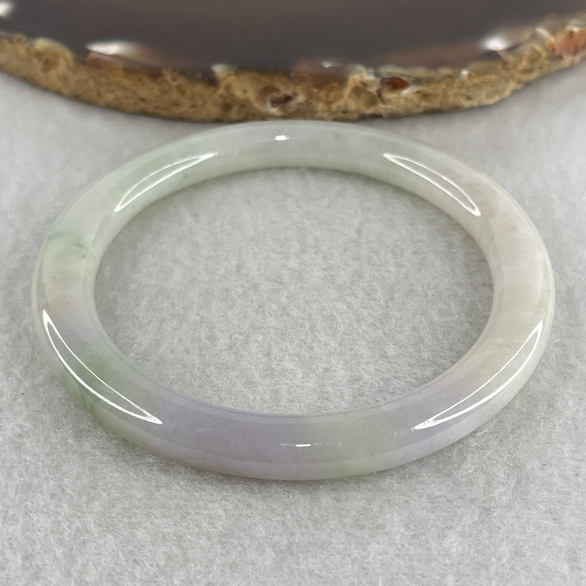 Natural Type A Light Green with Lavender Piao Hua Jadeite Flat Ding Dang Bangle 25.41g Inner Diameter 51.6mm 6.7 by 7.7mm (Slight Internal Line) - Huangs Jadeite and Jewelry Pte Ltd