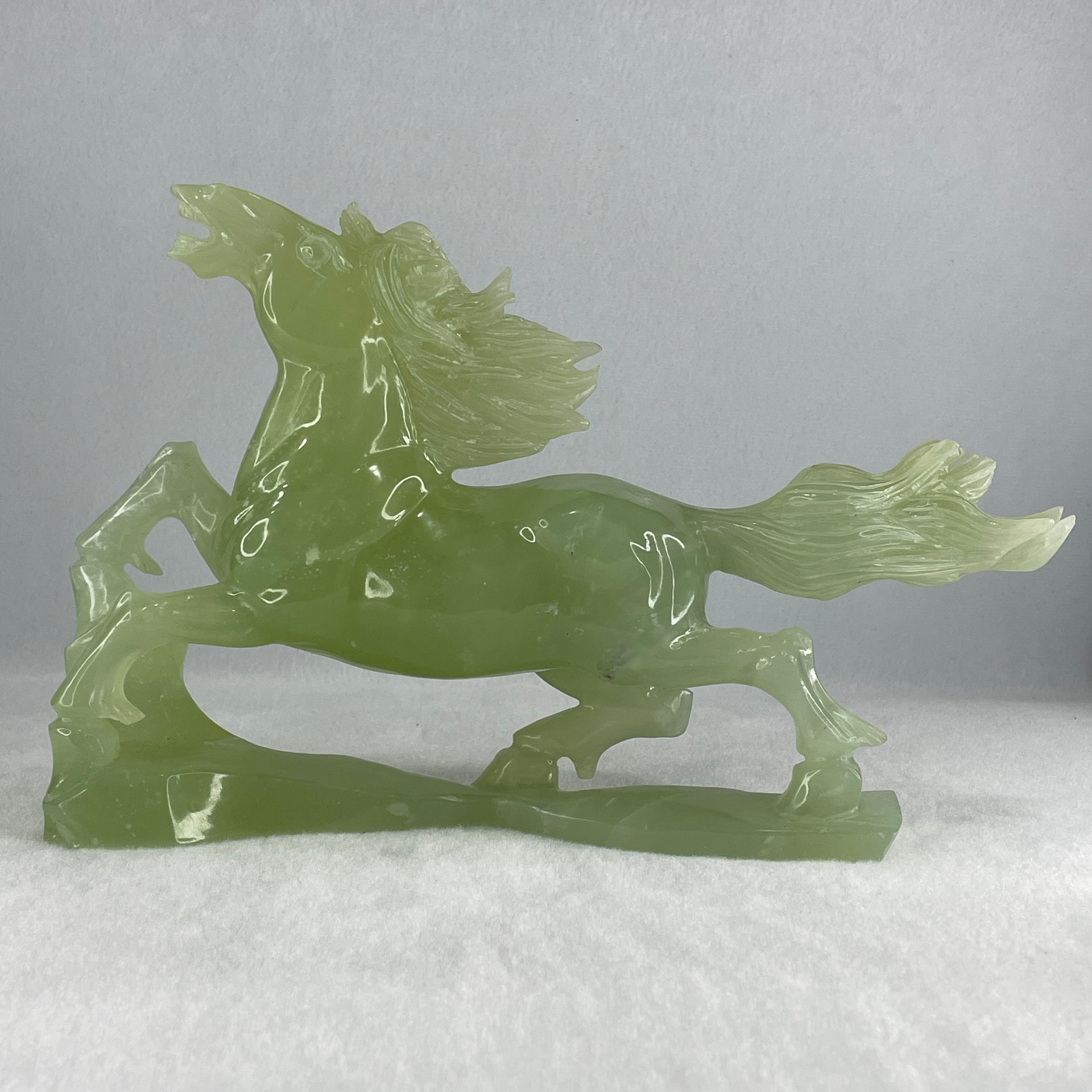 Natural Light Green Serpentine Victory Horse with Wooden Stand Display 1,274.6g 255.0 by 90.0 by 183.0mm - Huangs Jadeite and Jewelry Pte Ltd