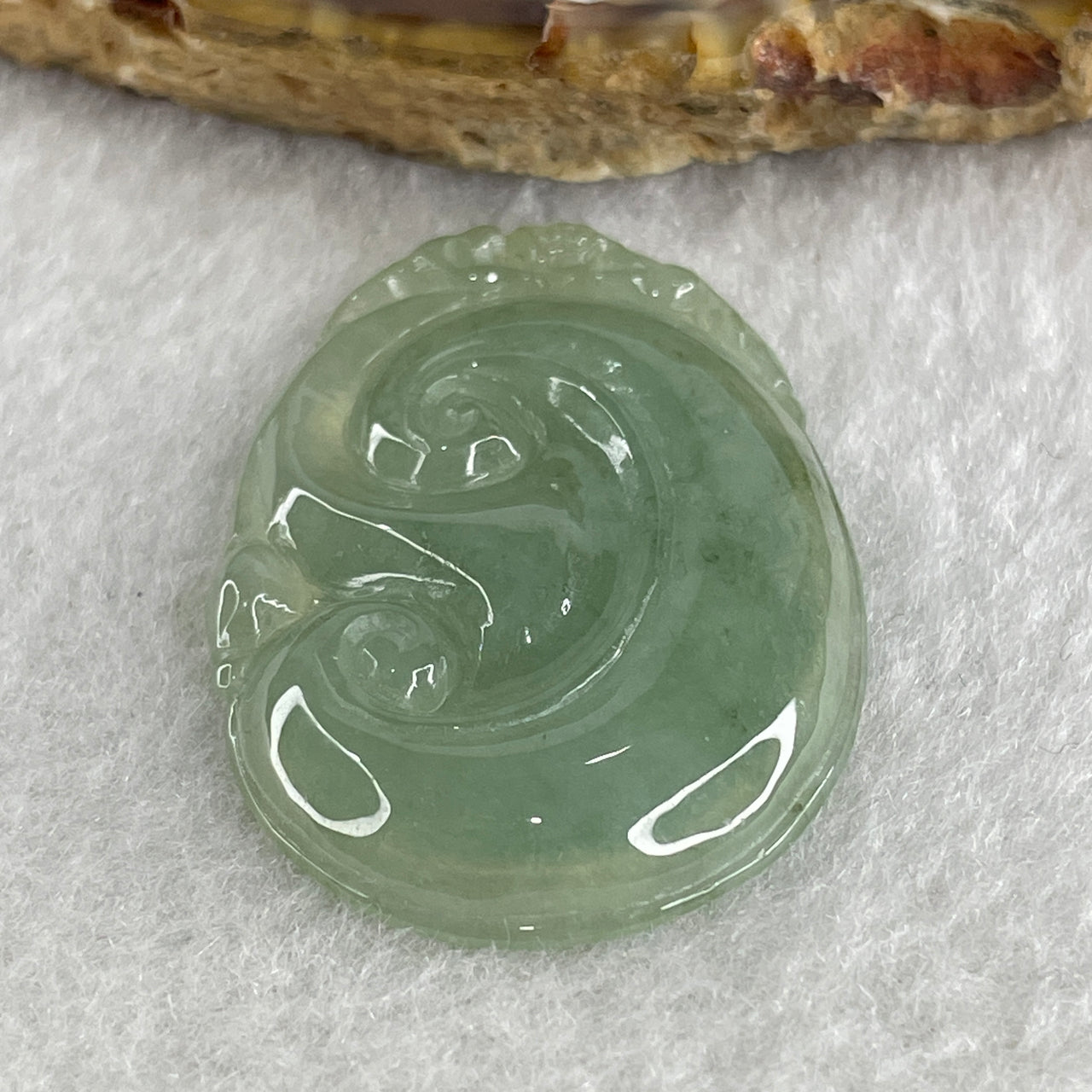 Natural Type A Semi Icy Green Jadeite Monkey on Ruyi Pendant 6.96g 37.6 by 25.5 by 4.4mm - Huangs Jadeite and Jewelry Pte Ltd