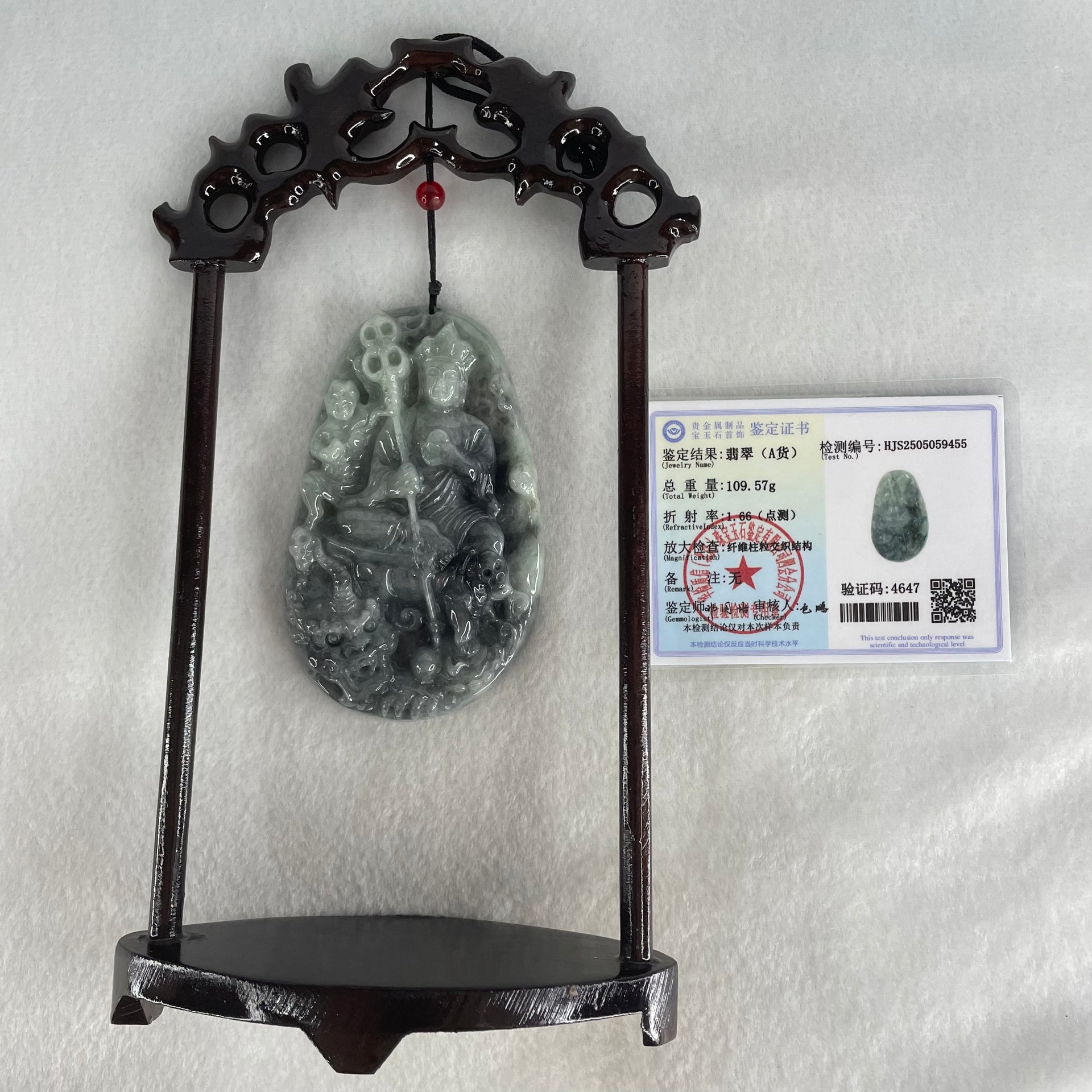 Type A Green With Wuji Grey Piao Hua Jadeite Ksitigarbha Bodhisattva, 地藏王菩萨, the Bodhisattva of Great Aspiration Display 178.8g 111.7 by 51.8 by 200.0mm - Huangs Jadeite and Jewelry Pte Ltd