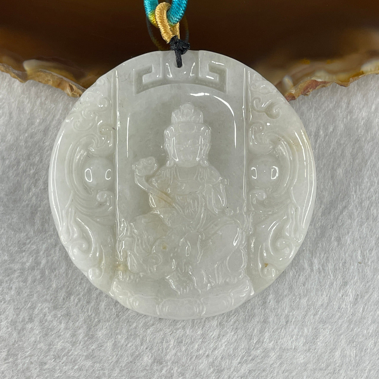 Natural Type A Faint Lavender Faint Green with Red Spots Jadeite Guan Yin Bodhisattva or Siṃhanāda Avalokiteśvara or Guanyin on Lion Roar Pendant 28.42g 51.0 by 5.6mm