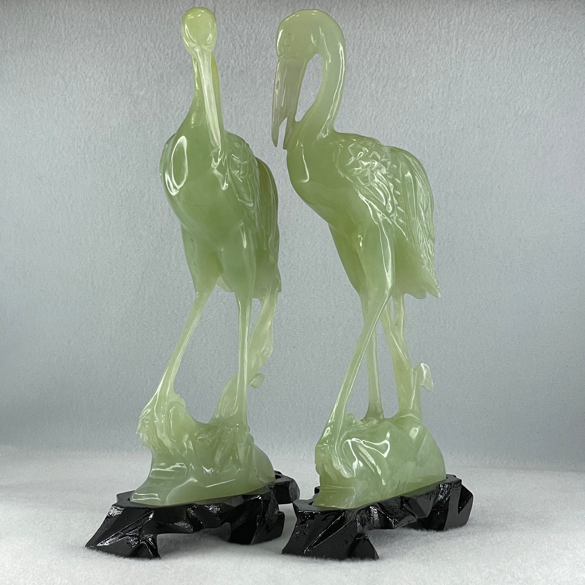 Natural Light Green Serpentine Pair of Cranes Bird with Wooden Stand Display 1,231.1g Each about 135.0 by 60.0 by 240.0mm - Huangs Jadeite and Jewelry Pte Ltd