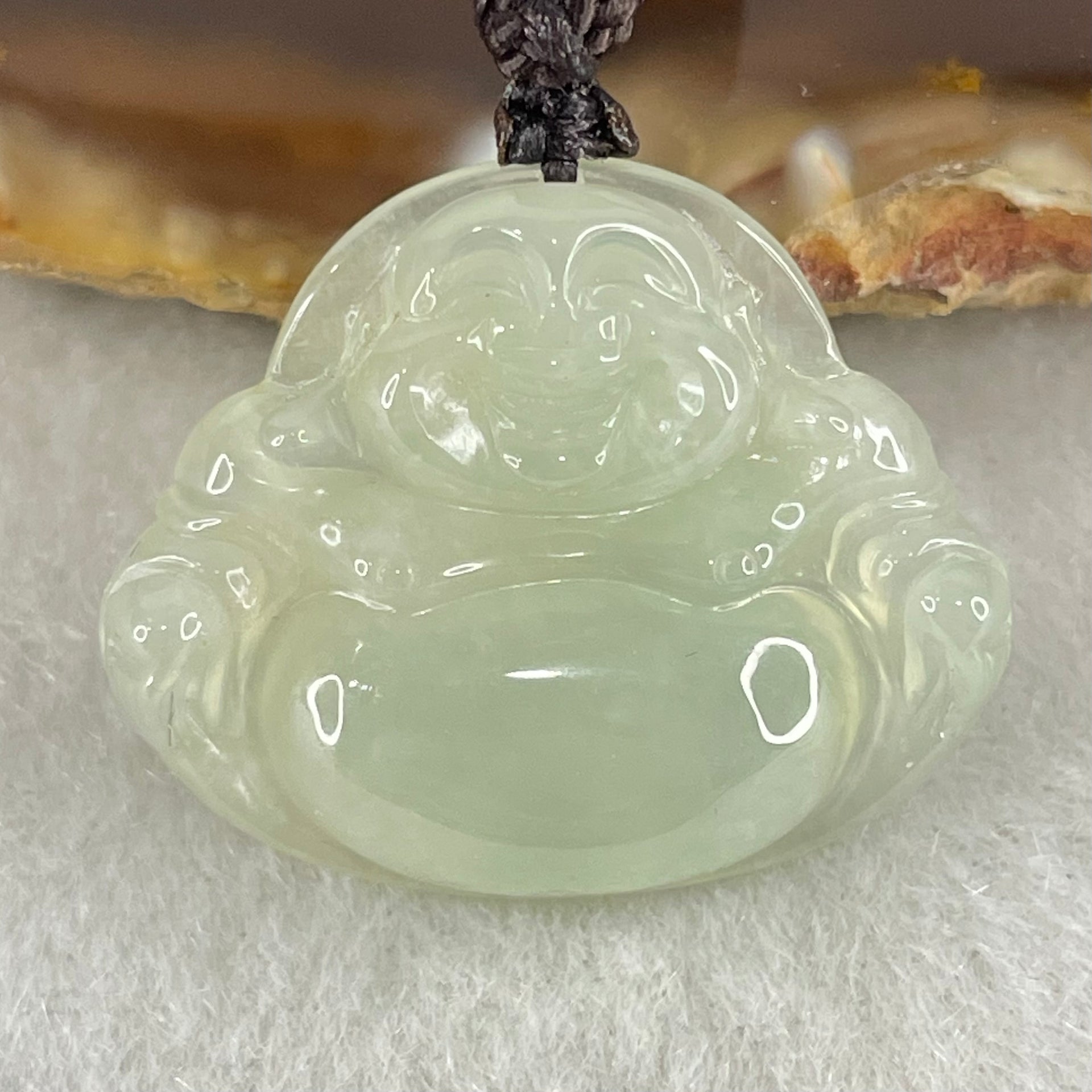 Type A Icy Faint Green Jadeite Milo Buddha Pendant 3.01g 22.4 by 27.1 by 6.0mm - Huangs Jadeite and Jewelry Pte Ltd