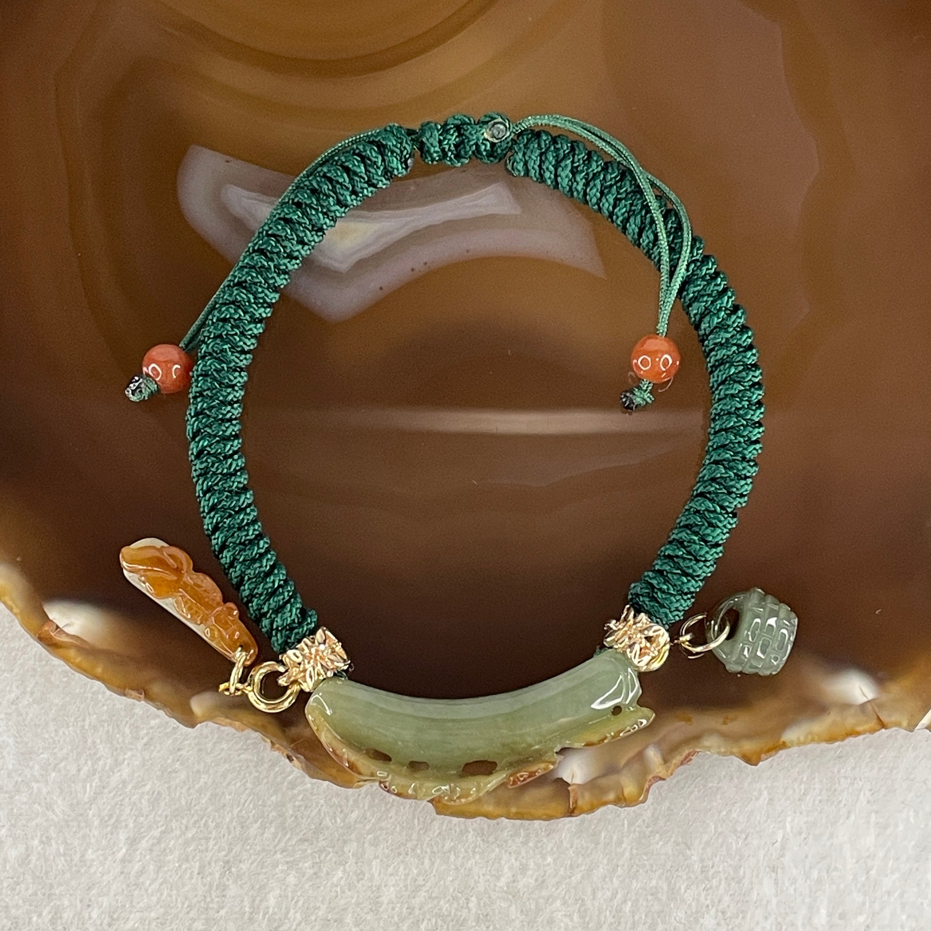 Natural Type A Brownish with Green Jadeite Flowers with Gold Fish and Bag Charms Bracelet 12.29g 17cm 7.0 by 10.9mm - Huangs Jadeite and Jewelry Pte Ltd